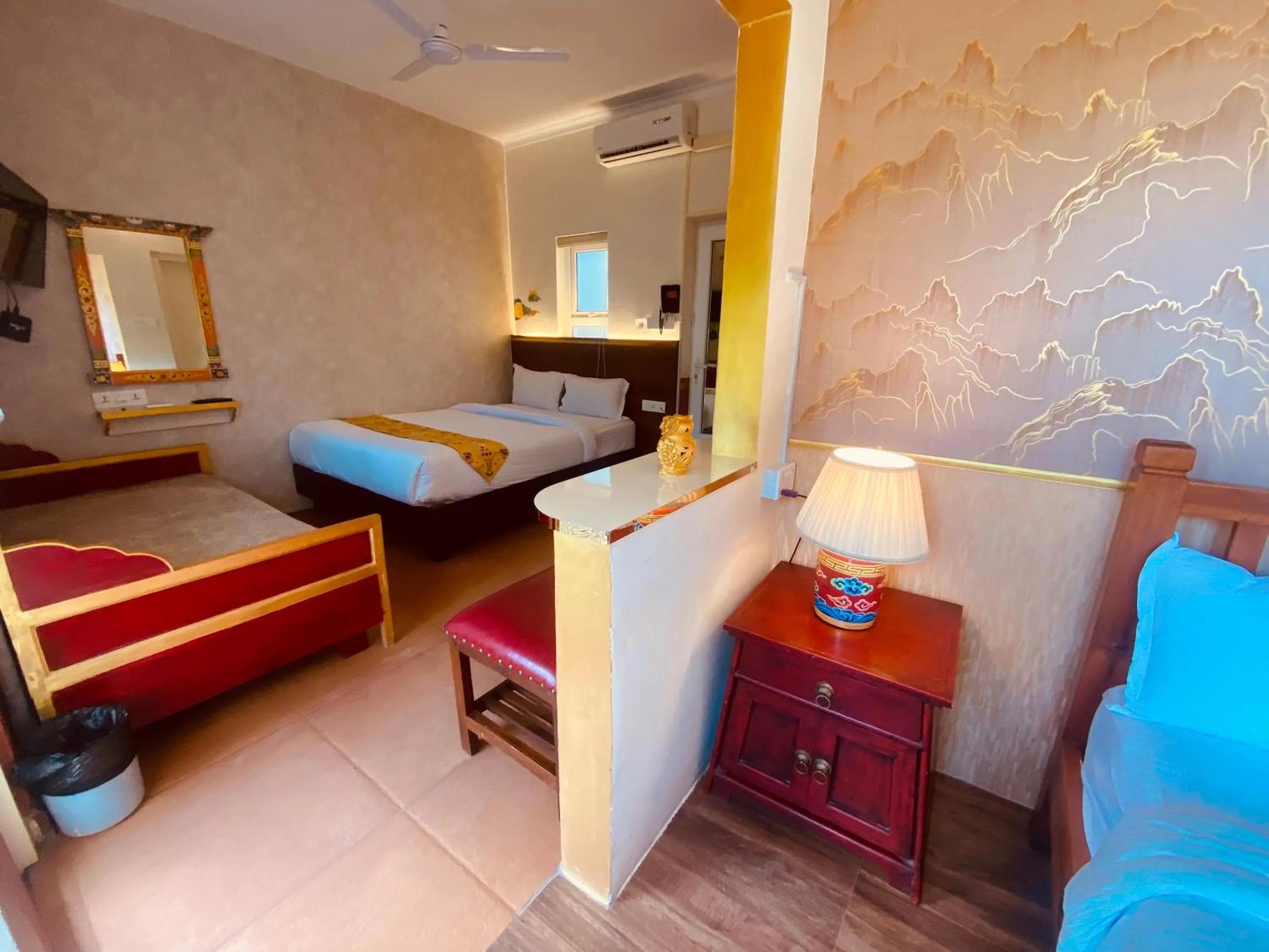 Bed in Three Jewels Boutique Hotel