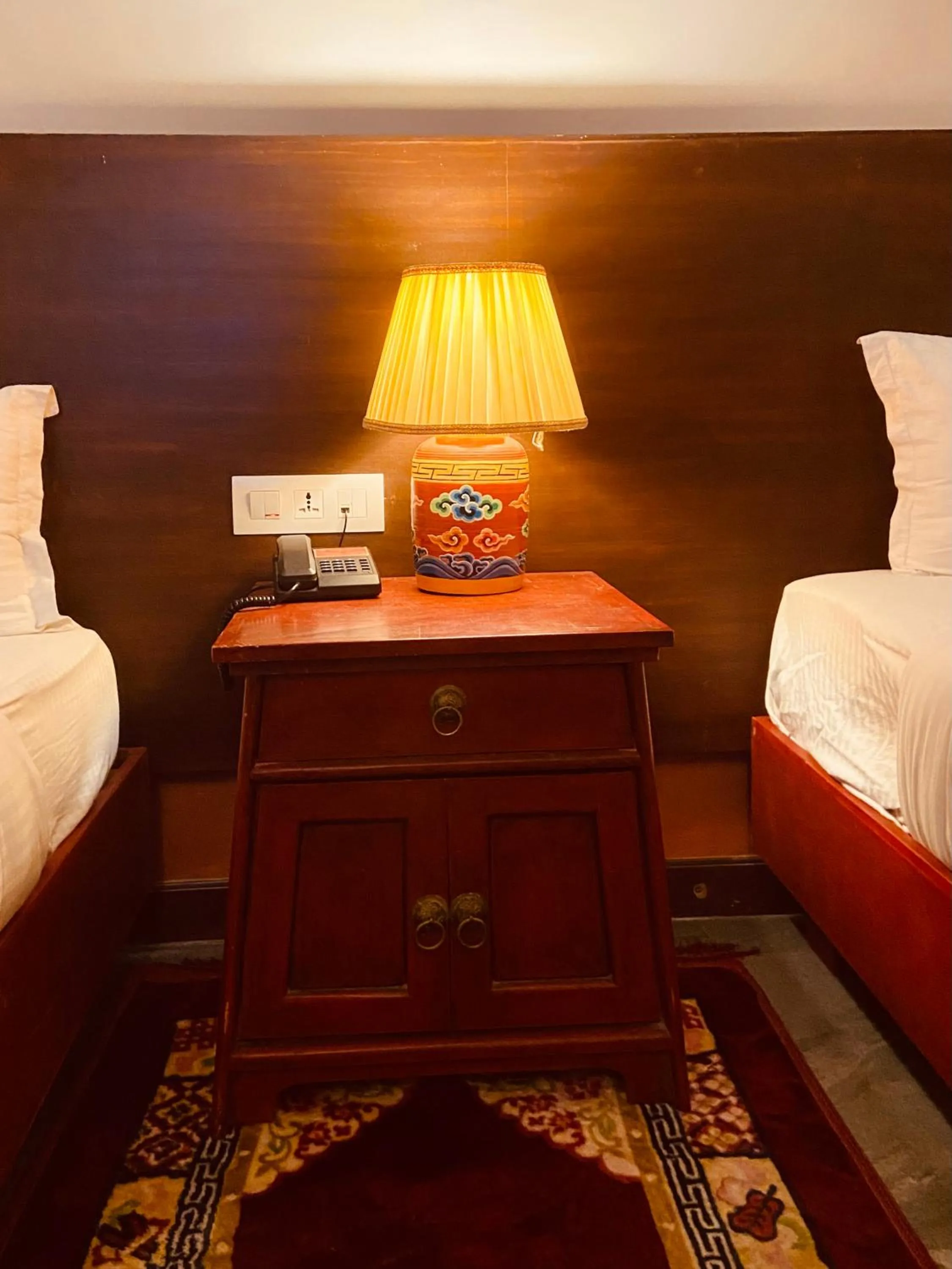 Bed in Three Jewels Boutique Hotel