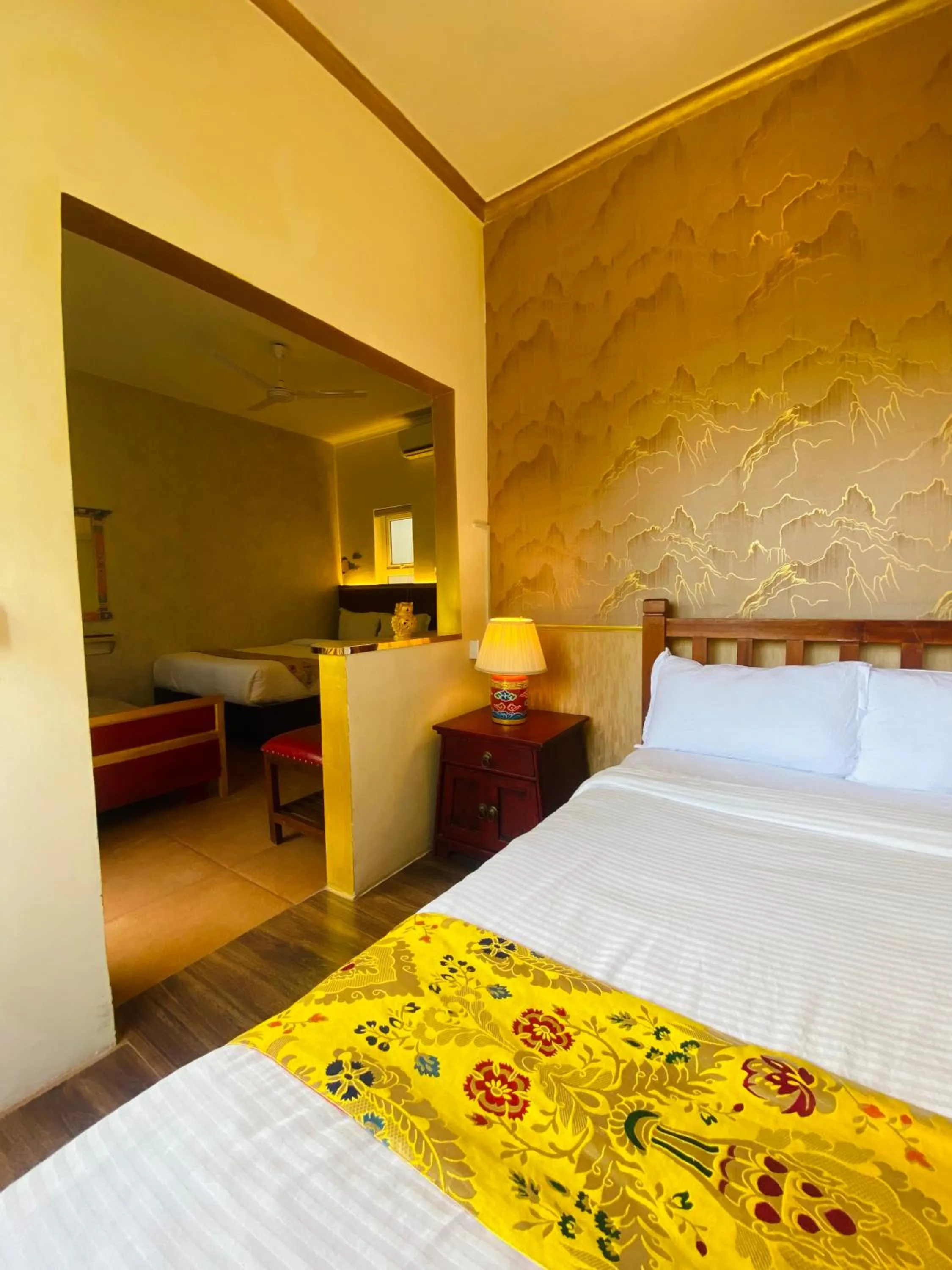 Bed in Three Jewels Boutique Hotel