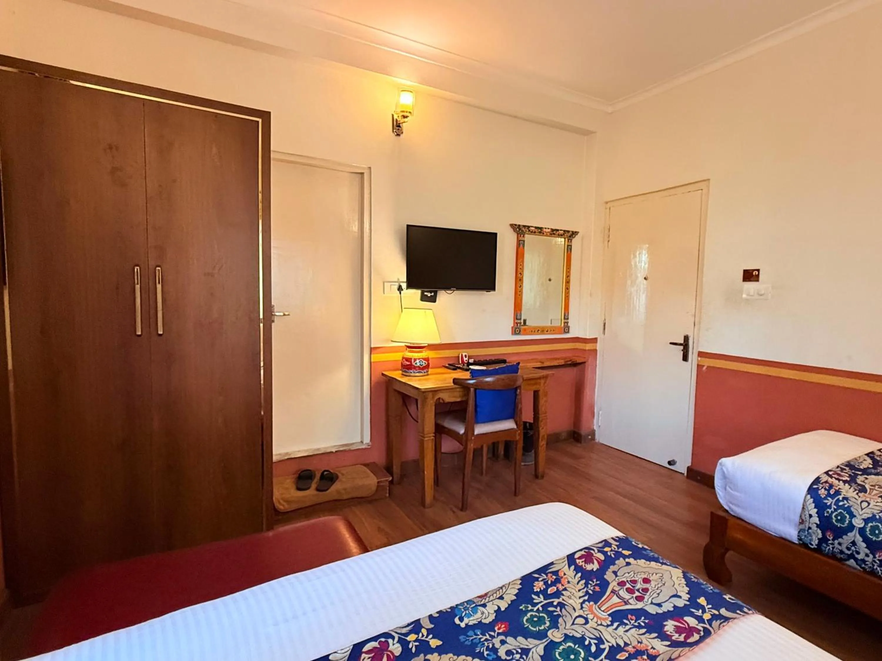 Bed in Three Jewels Boutique Hotel