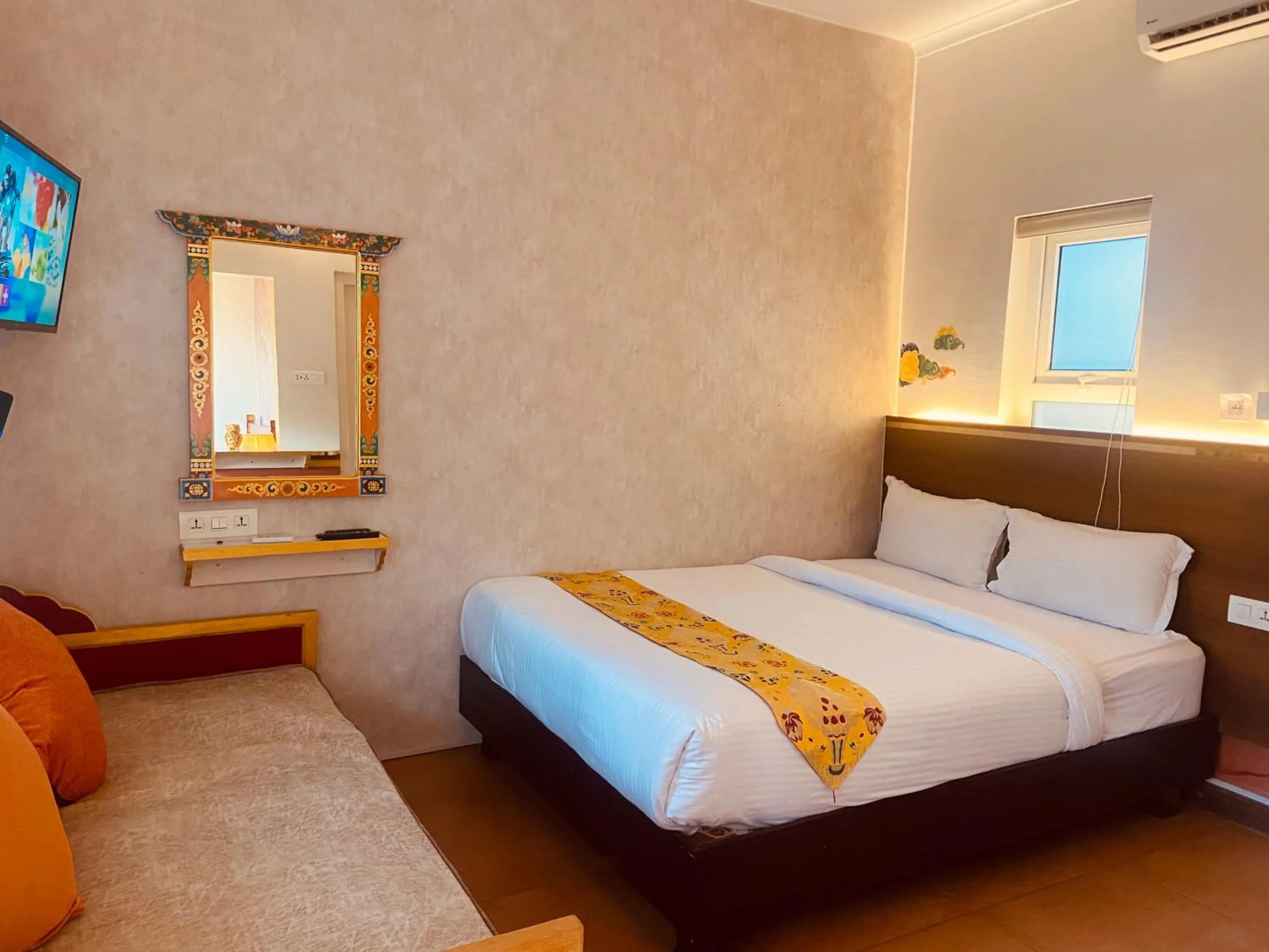 Bed in Three Jewels Boutique Hotel