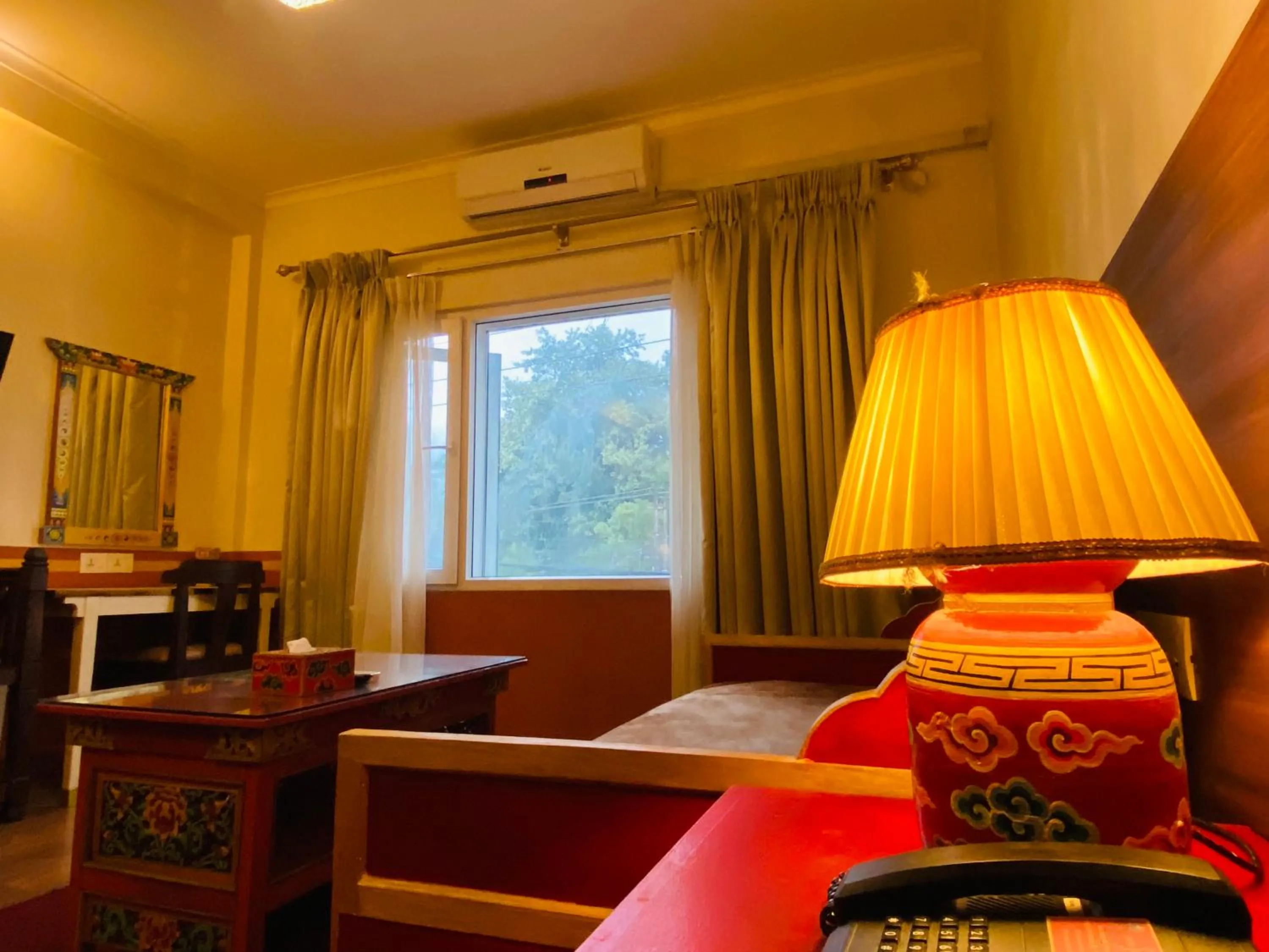 Bed in Three Jewels Boutique Hotel