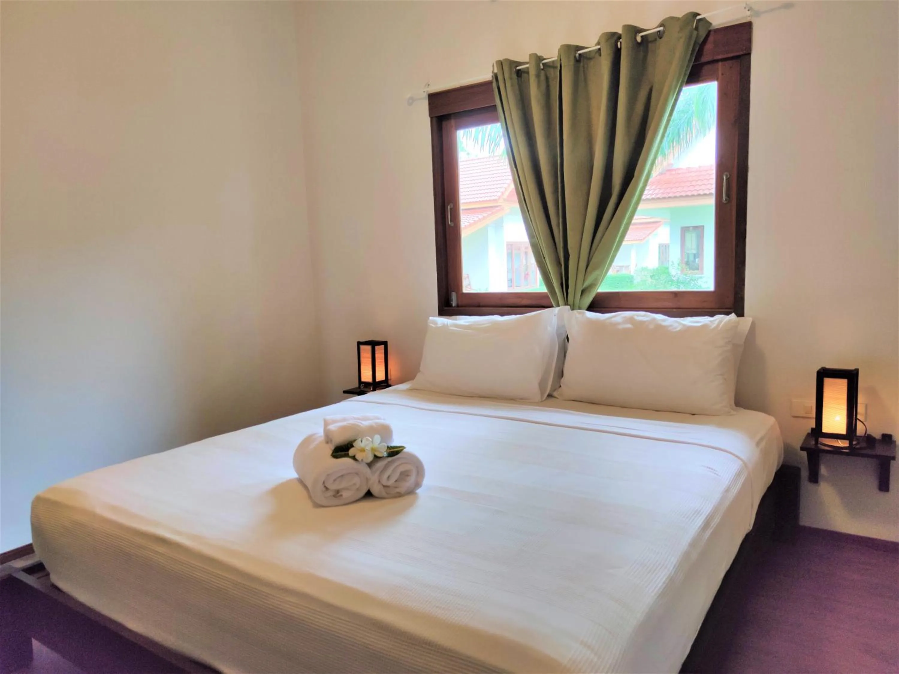 Bed in Armonia Village Resort and Spa