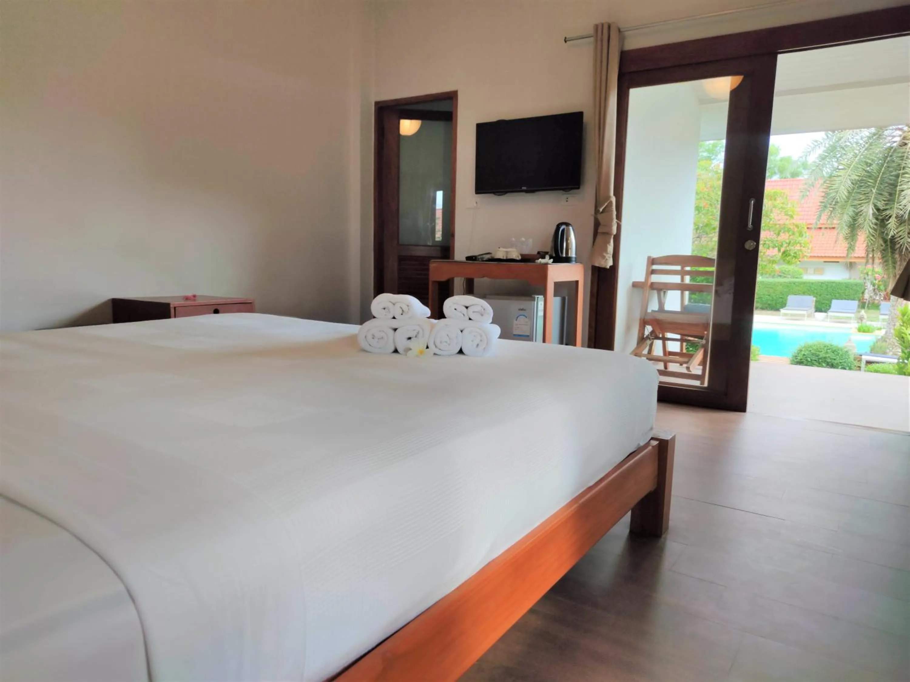 Bed in Armonia Village Resort and Spa