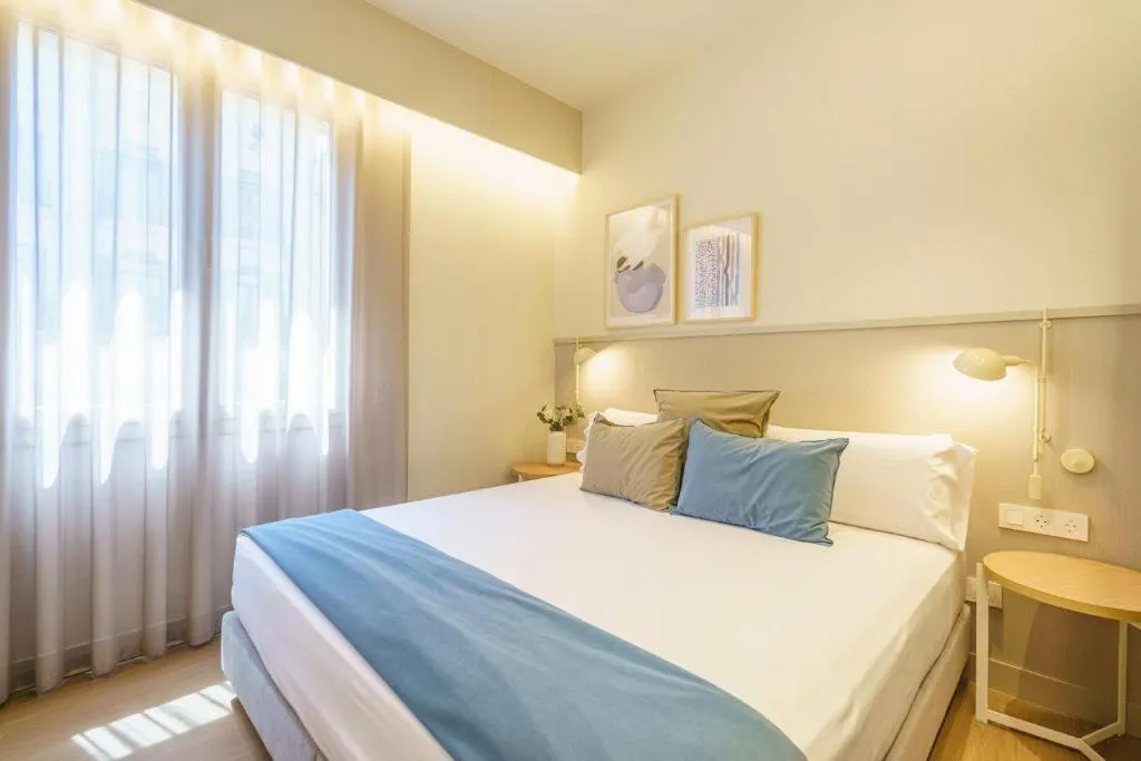 Bedroom, Bed in Fisa Rentals Ramblas Apartments