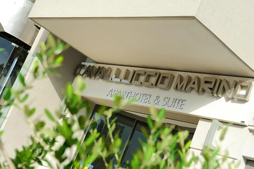 Property logo or sign in Hotel & Residence Cavalluccio Marino