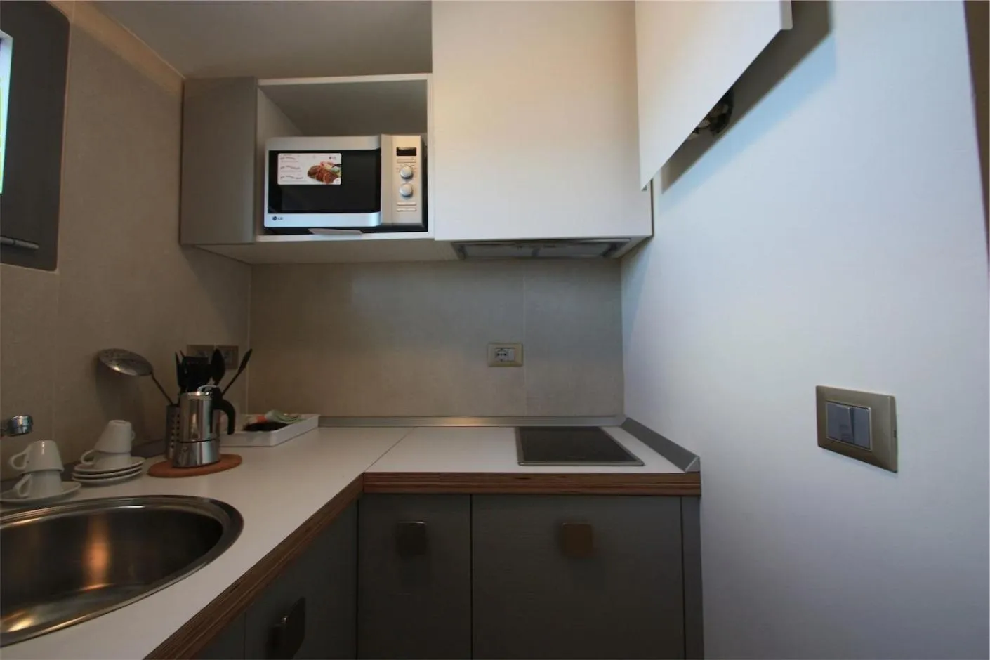 Kitchen or kitchenette in Hotel & Residence Cavalluccio Marino