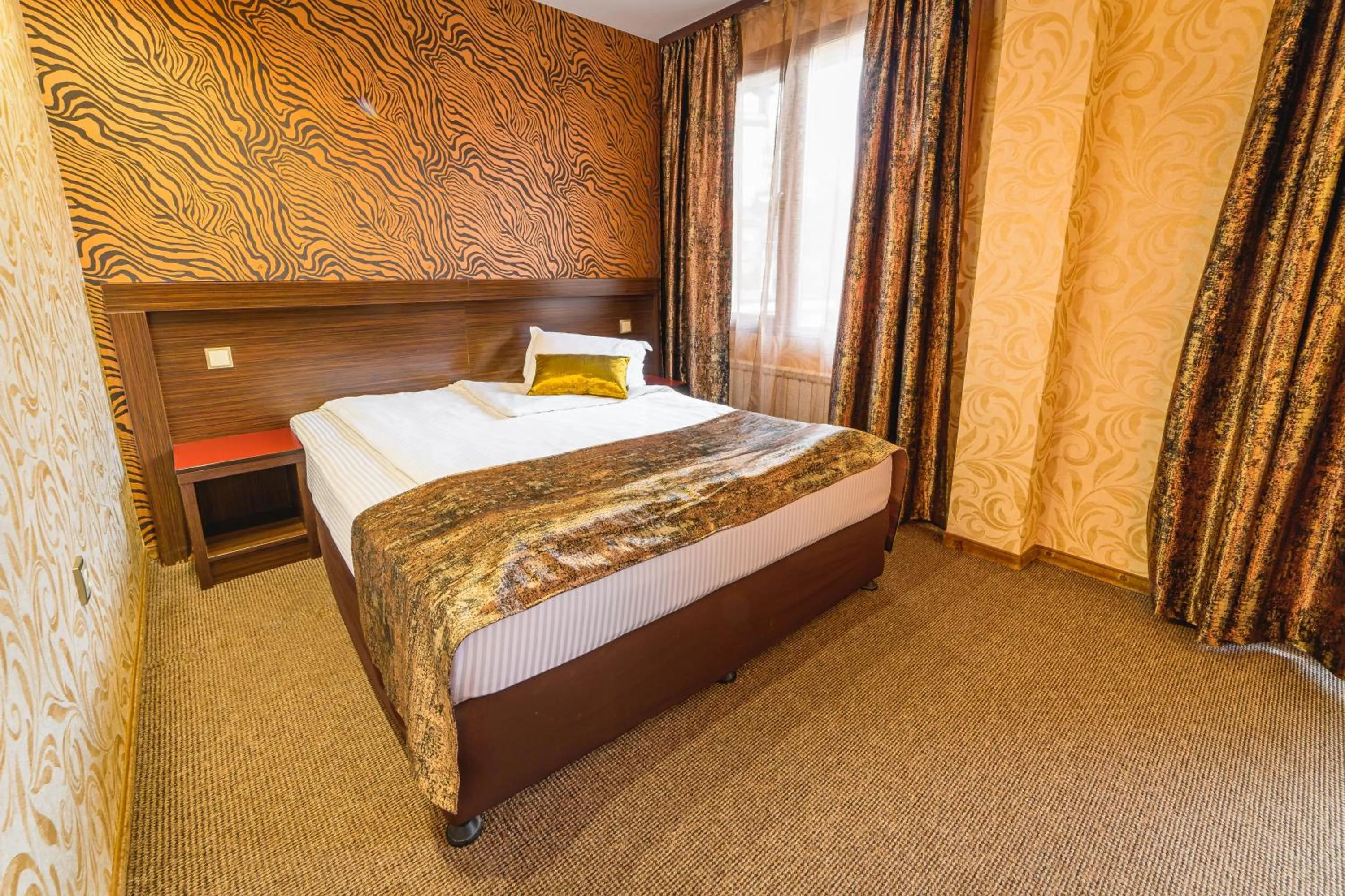 Bed in Eleganza Family Hotel - Free Parking