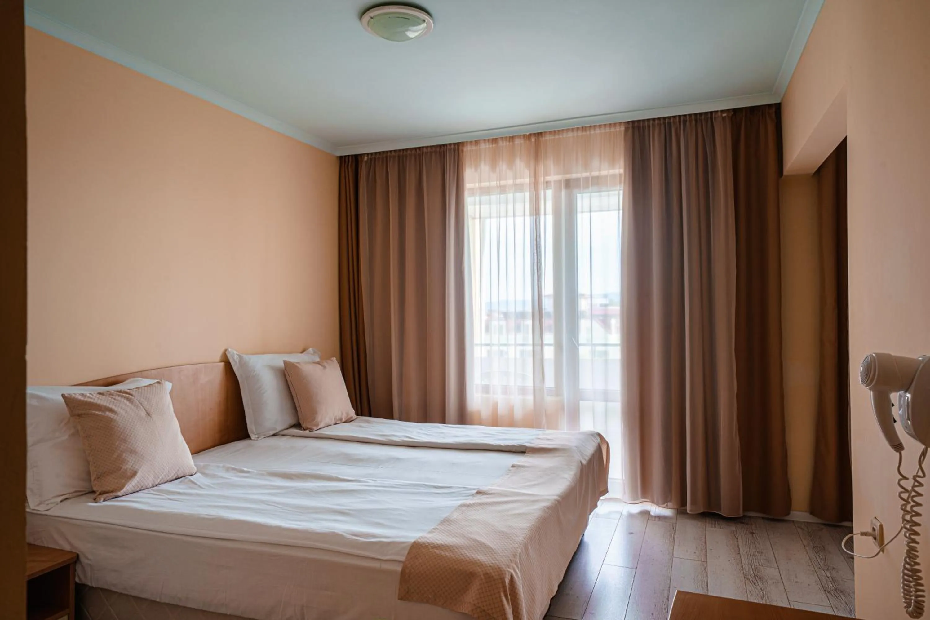 Bed in Perla Plaza Hotel - All Inclusive