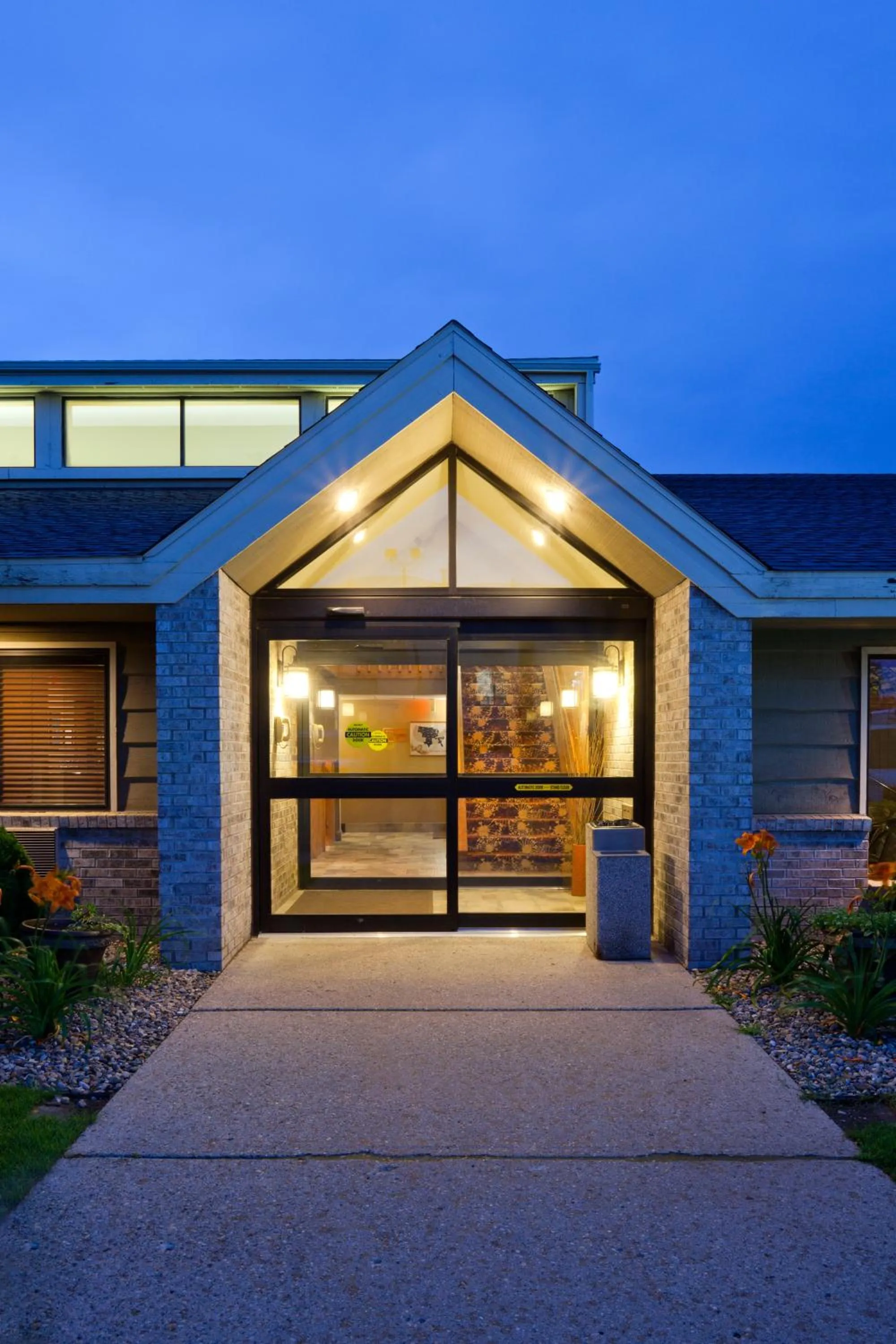 Property building in AmericInn by Wyndham Alexandria