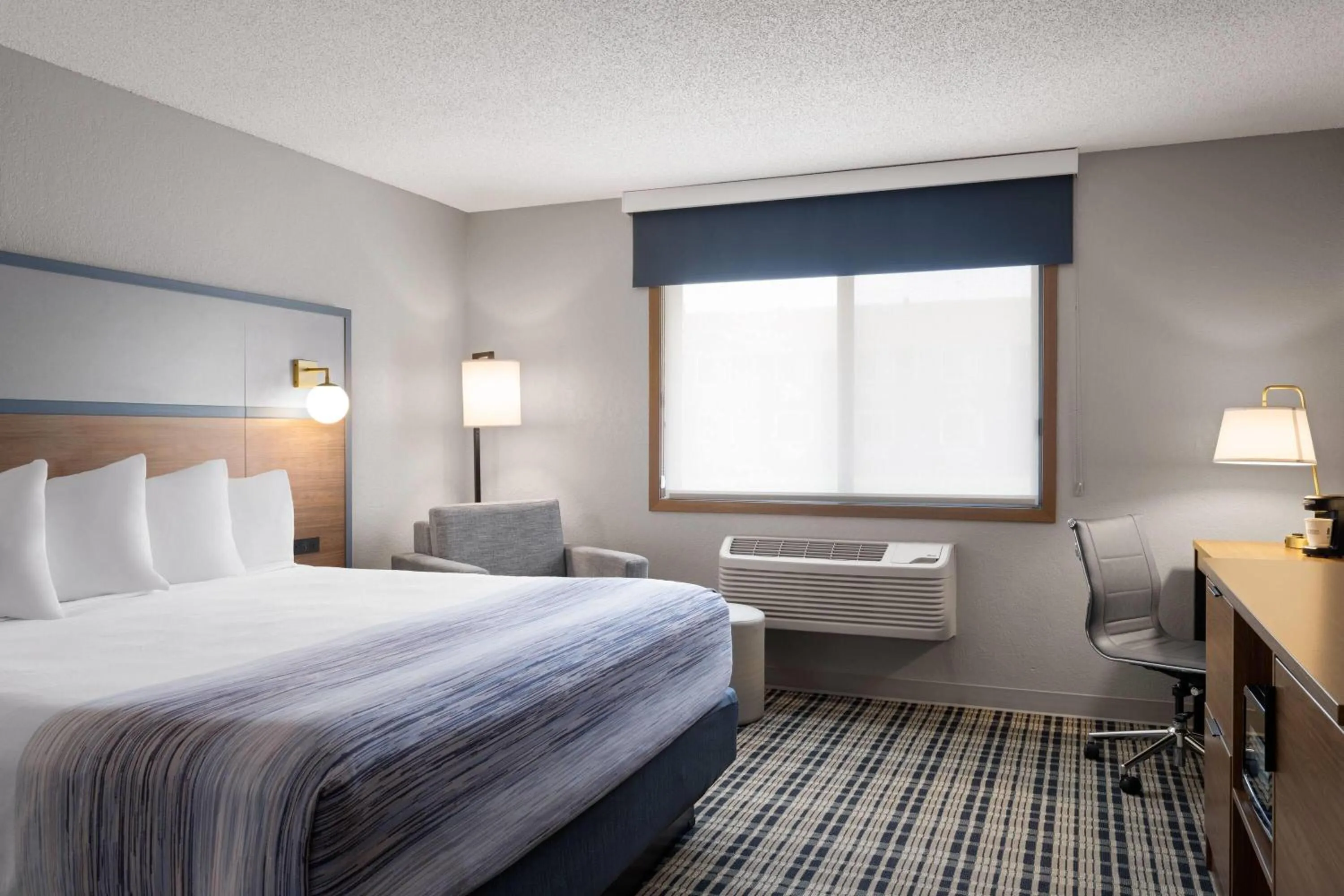 Photo of the whole room, Bed in AmericInn by Wyndham Alexandria