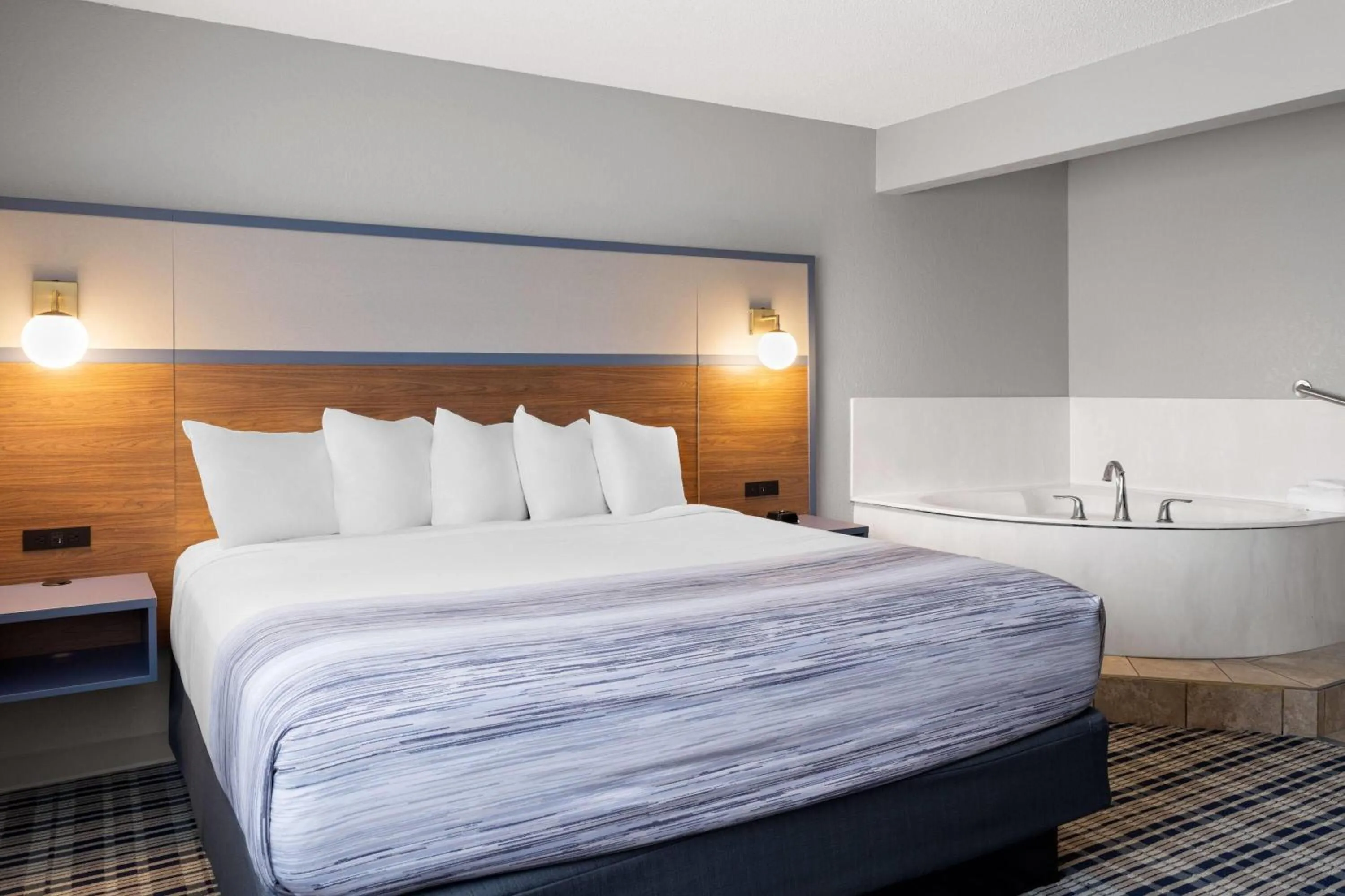 Bath, Bed in AmericInn by Wyndham Alexandria