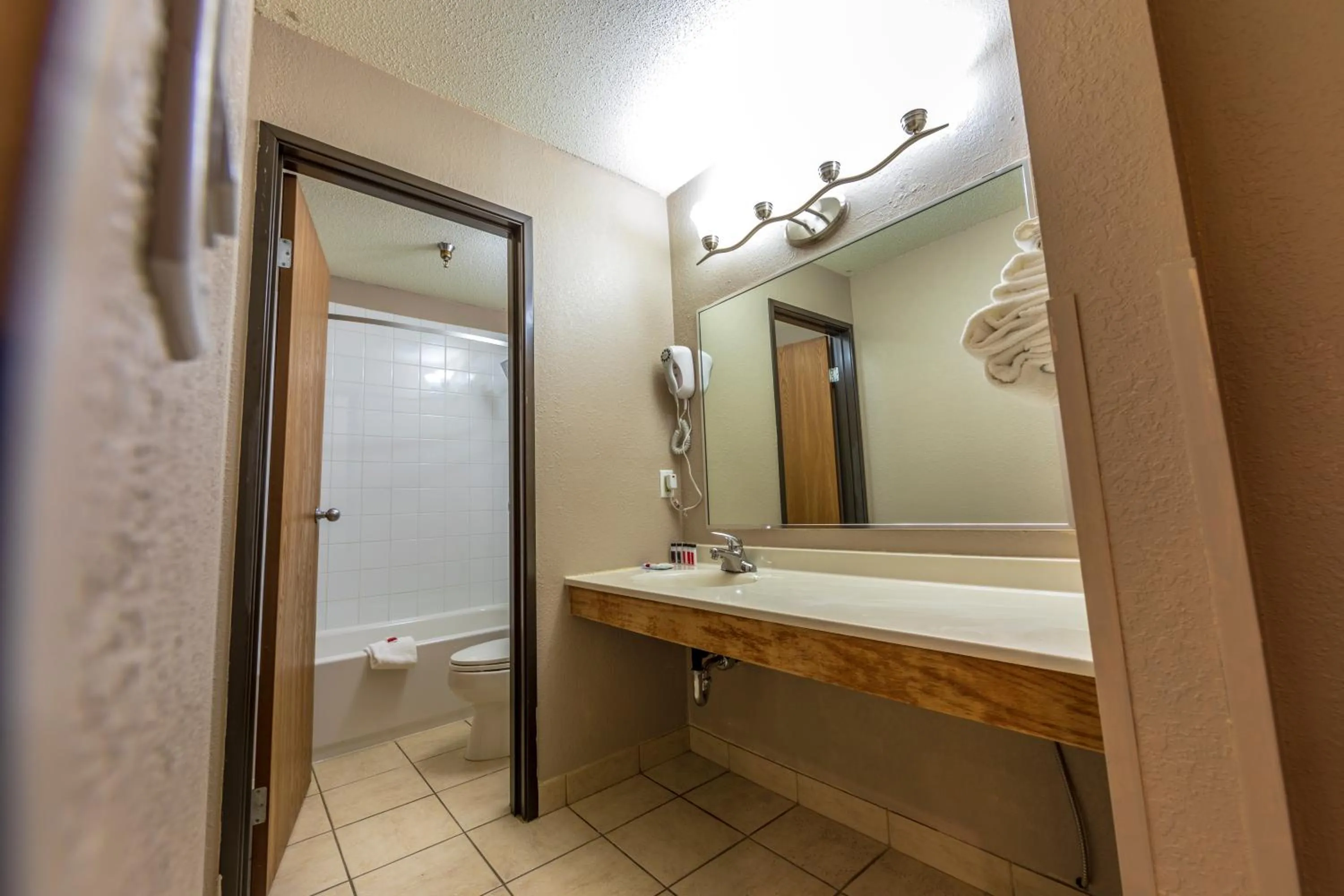 Bathroom in Super 8 by Wyndham Kamloops On The Hill