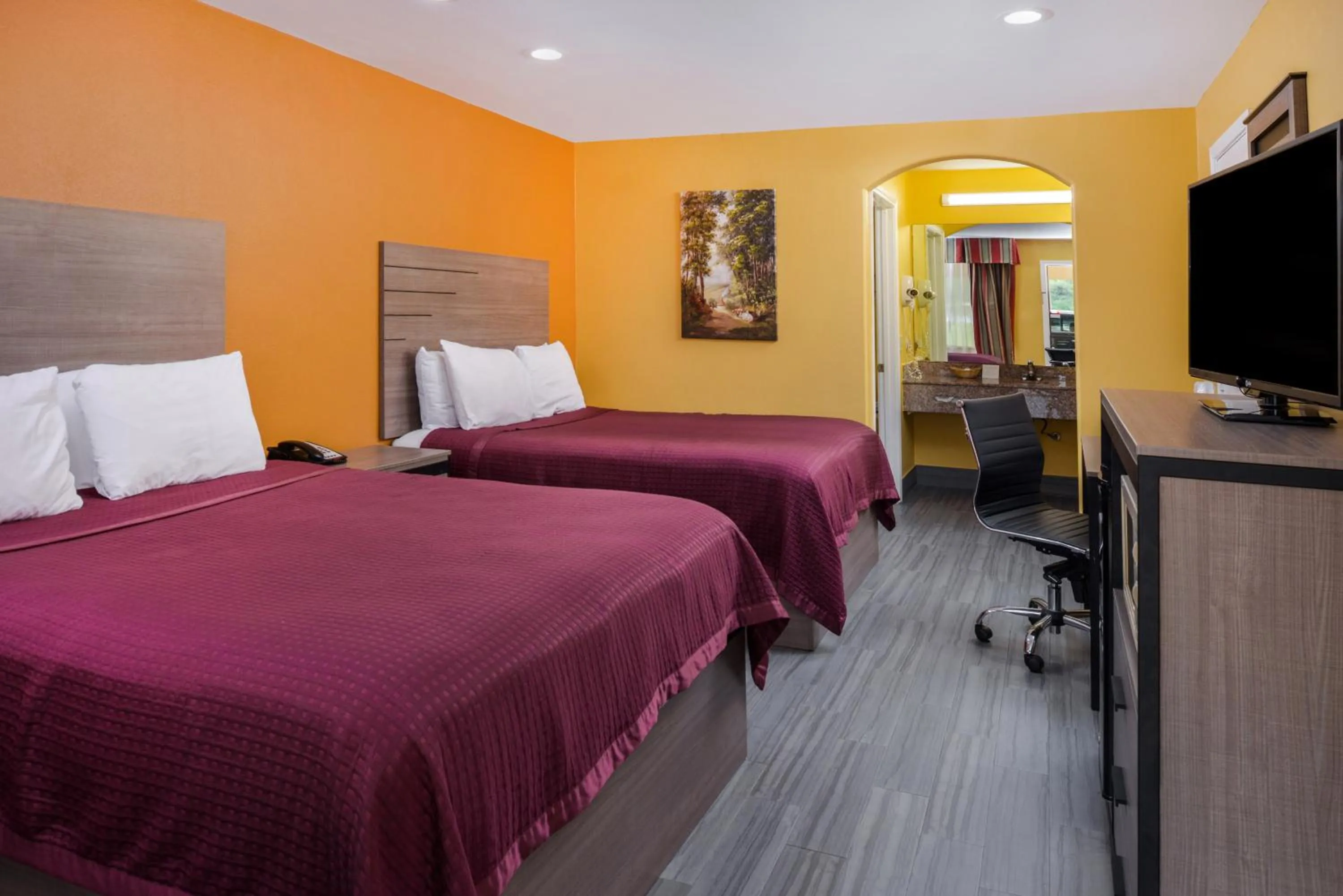 Bed in Americas Best Value Inn West Columbia