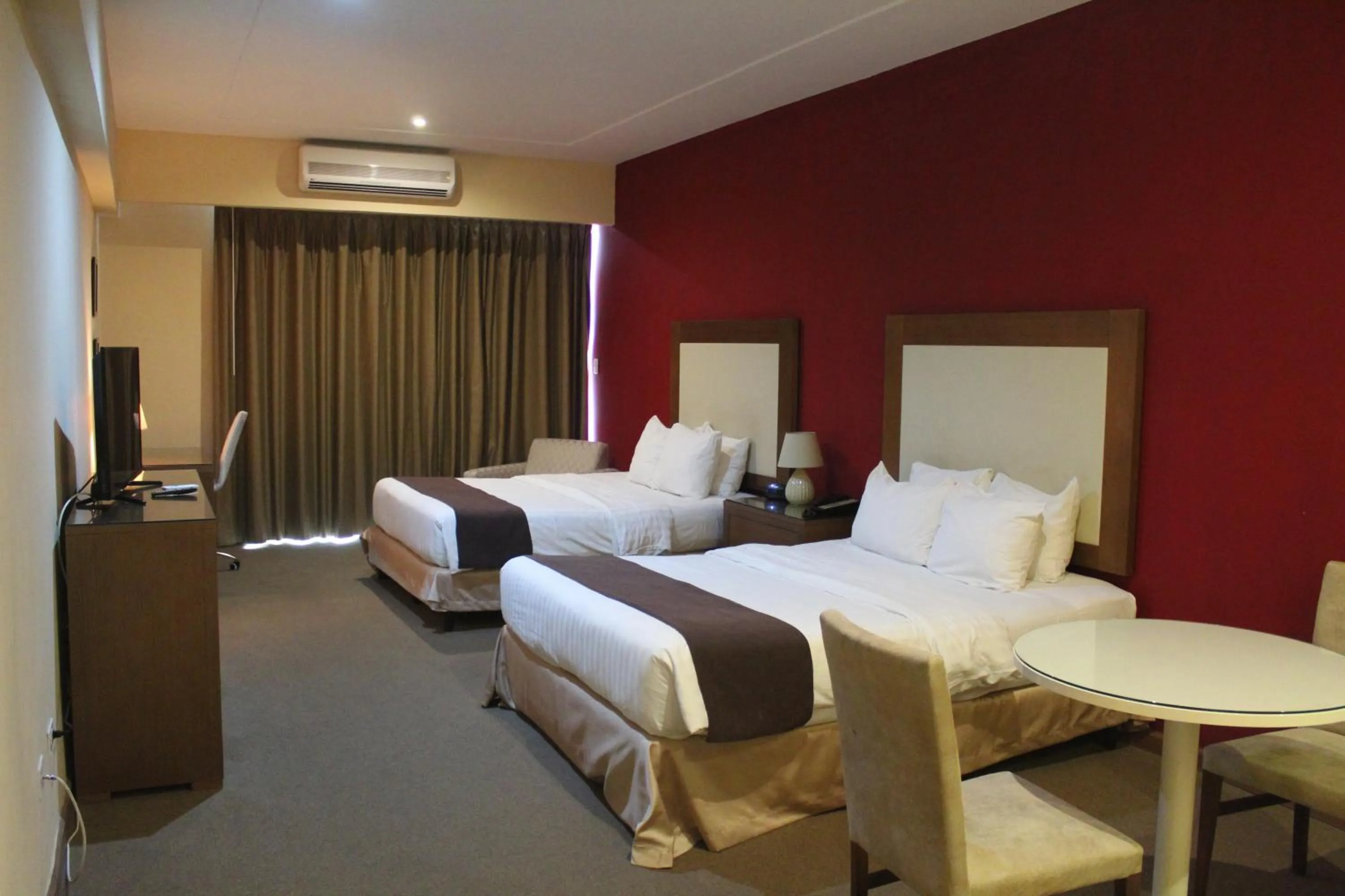 Bed in Central Park Hotel & Casino