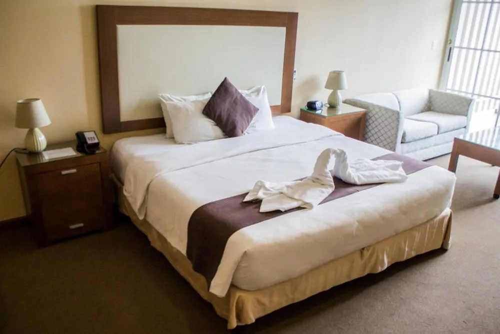 Photo of the whole room, Bed in Central Park Hotel & Casino