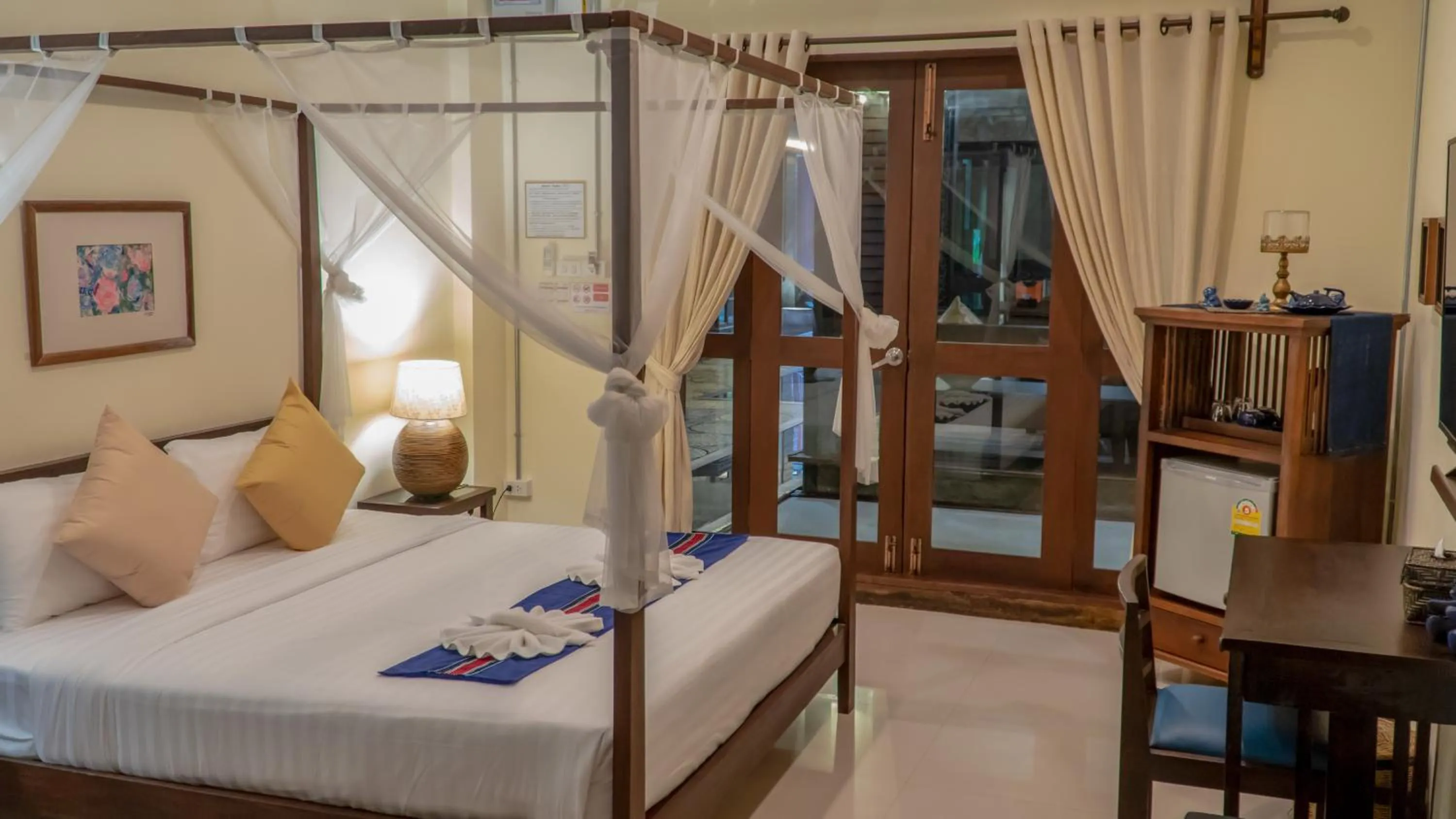 Bed in Sunny V Hotel