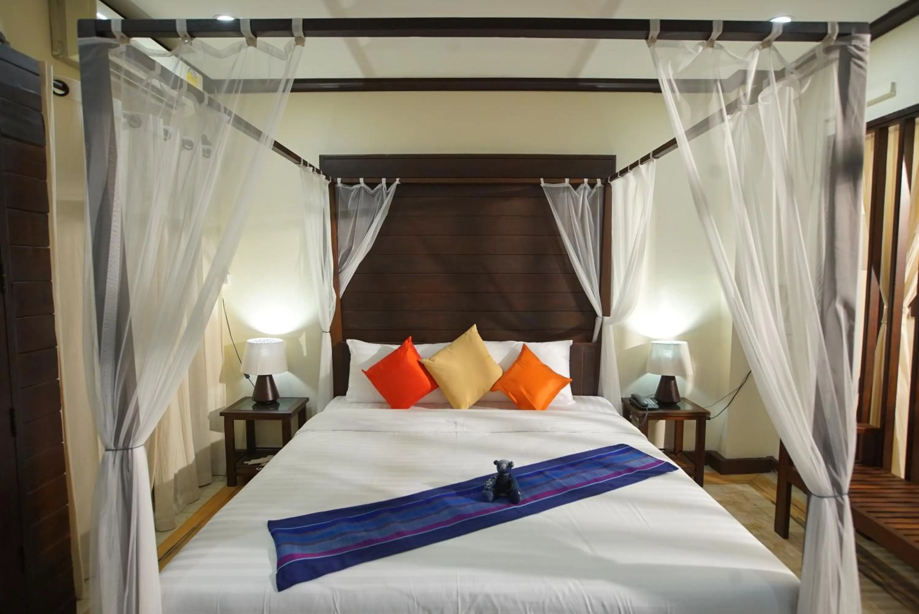 Bed in Sunny V Hotel