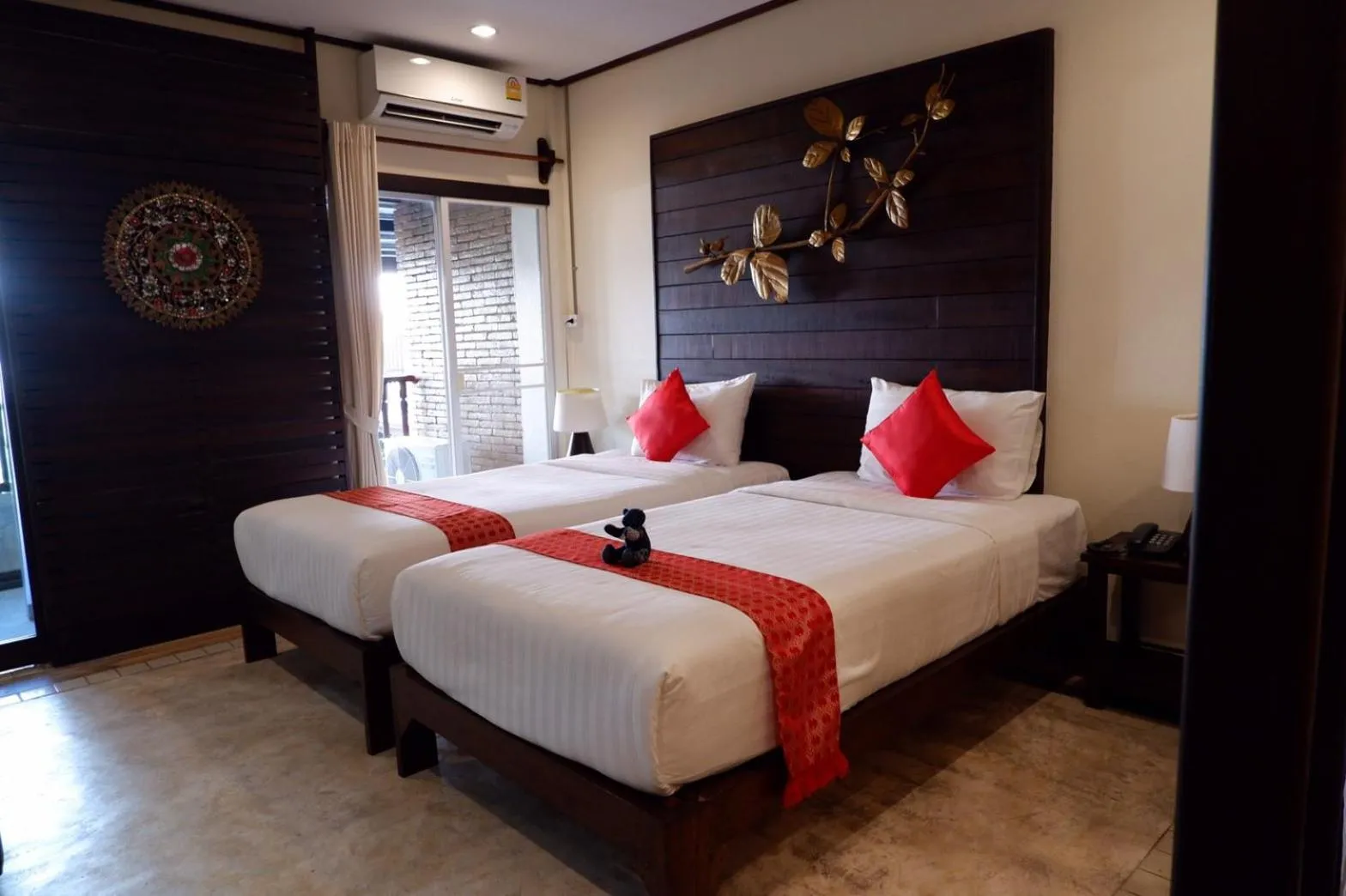 Bed in Sunny V Hotel