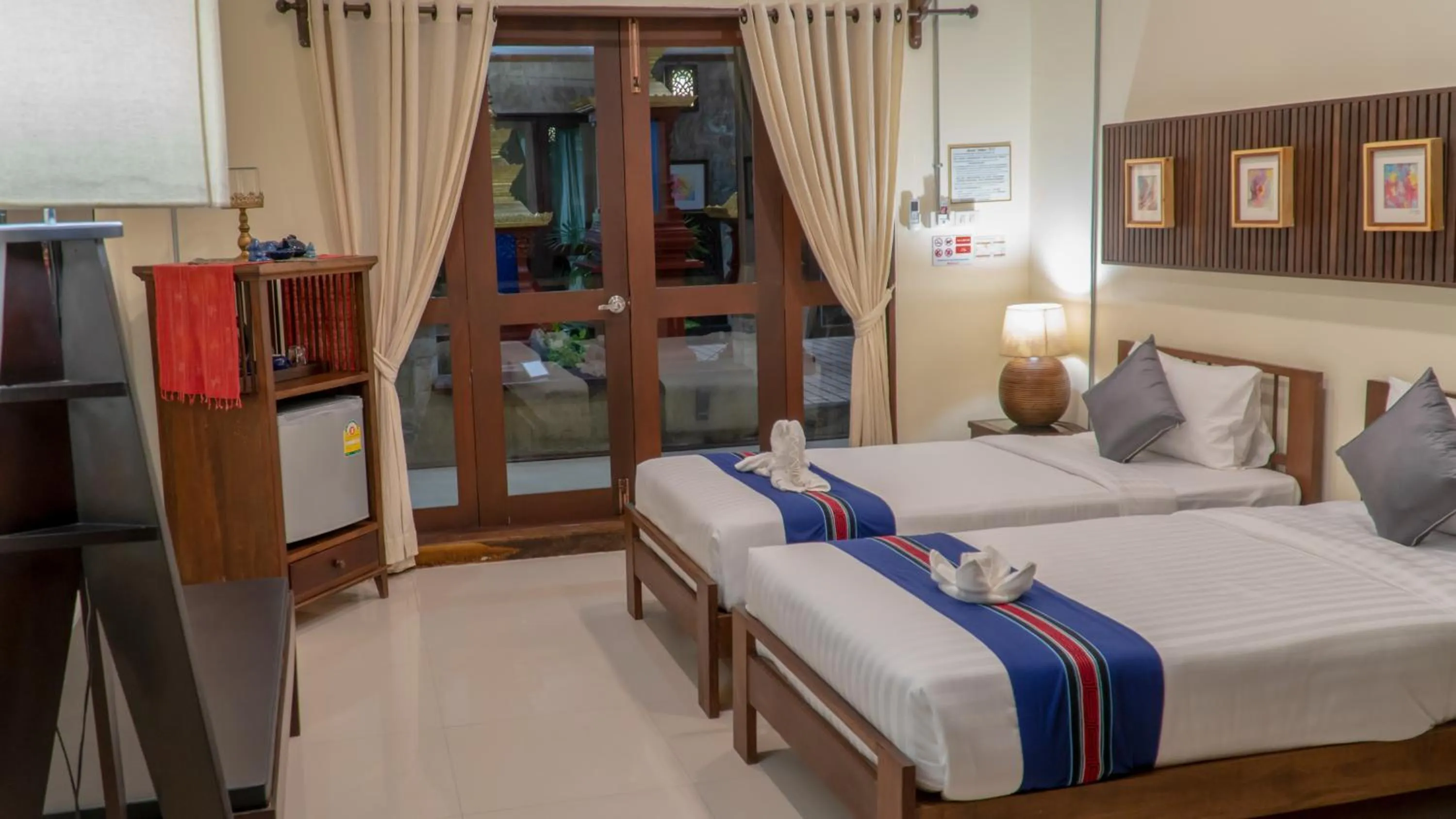 Bed in Sunny V Hotel