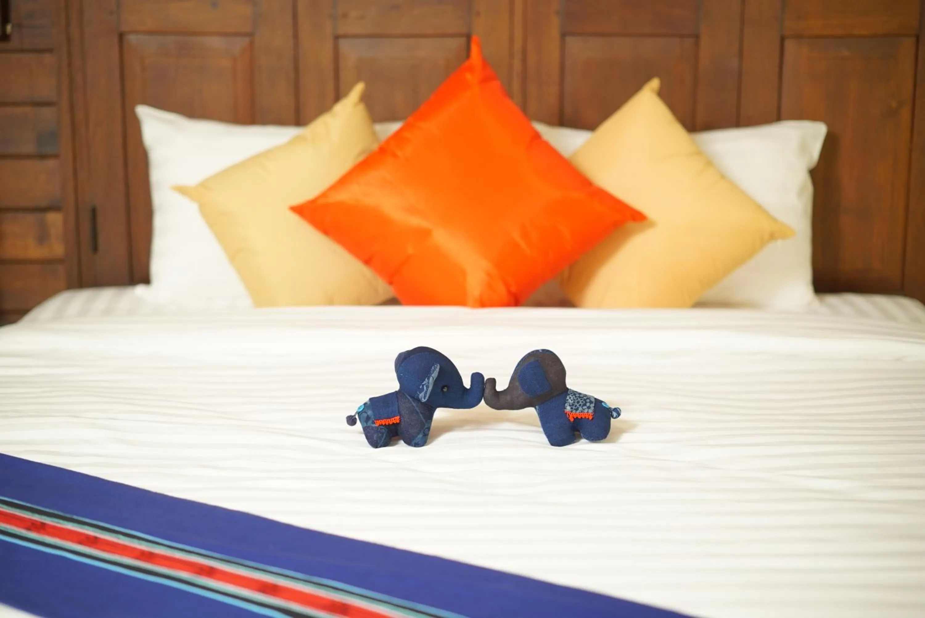 Bed in Sunny V Hotel