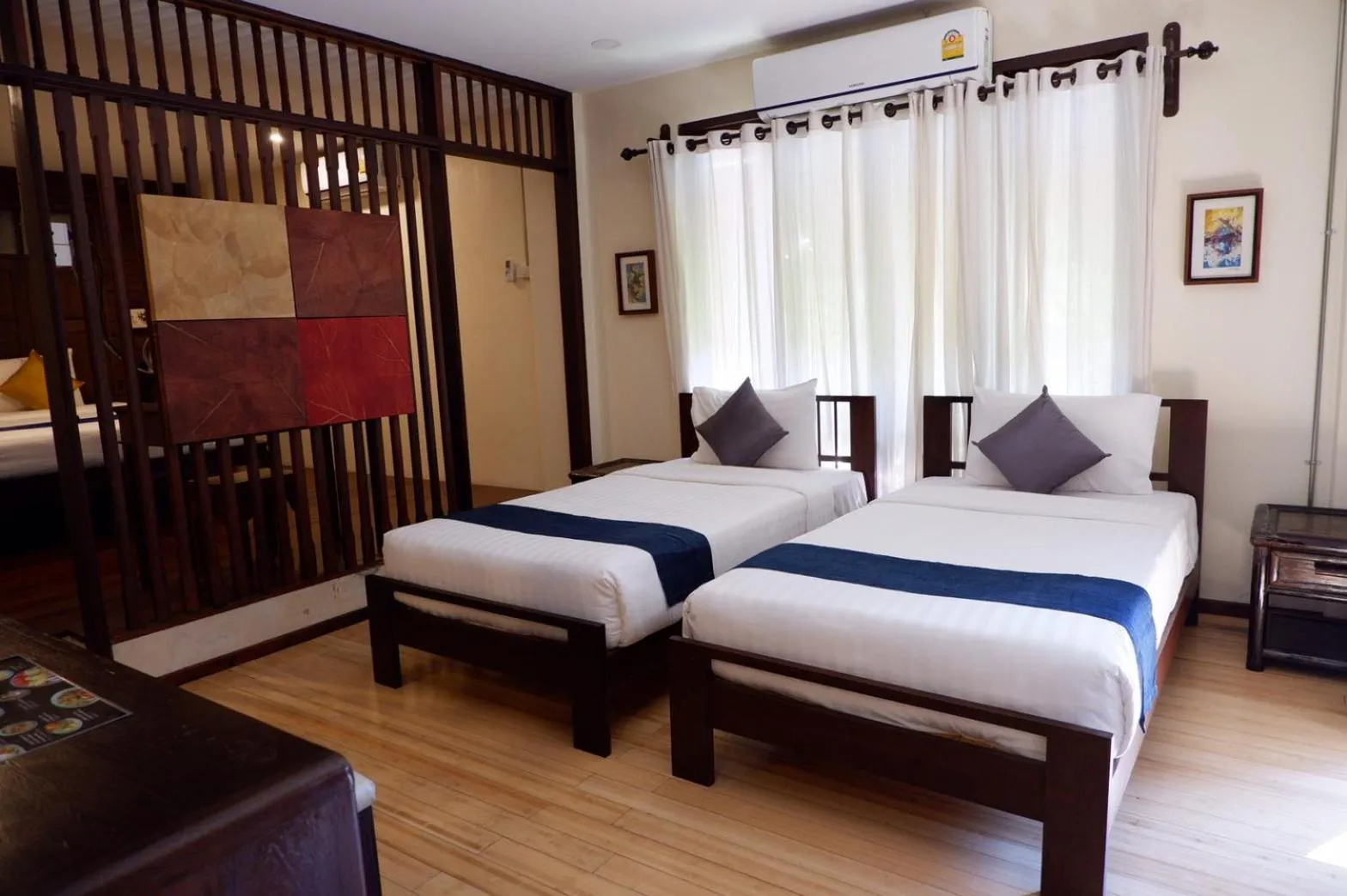 Bed in Sunny V Hotel