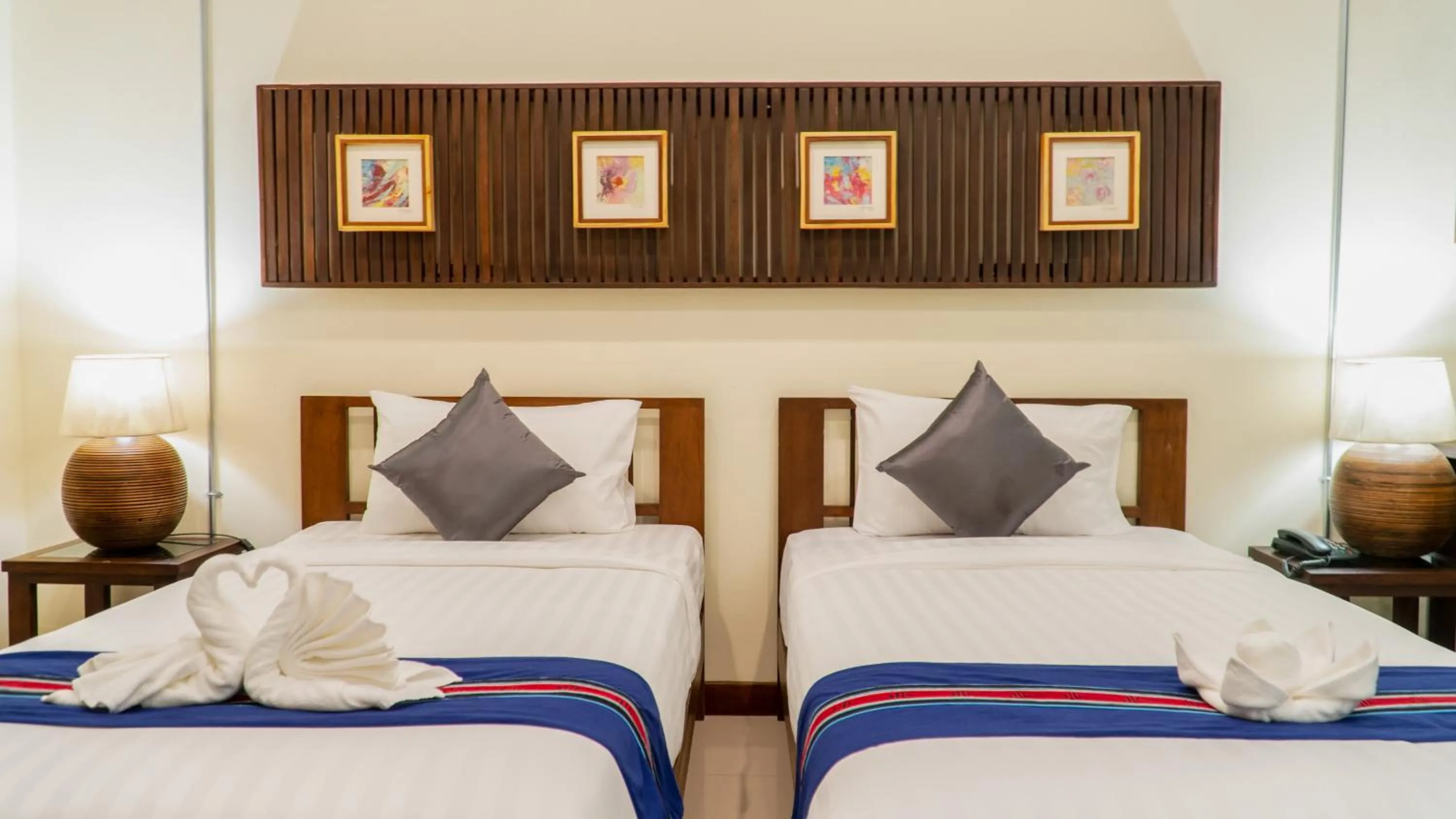 Bed in Sunny V Hotel