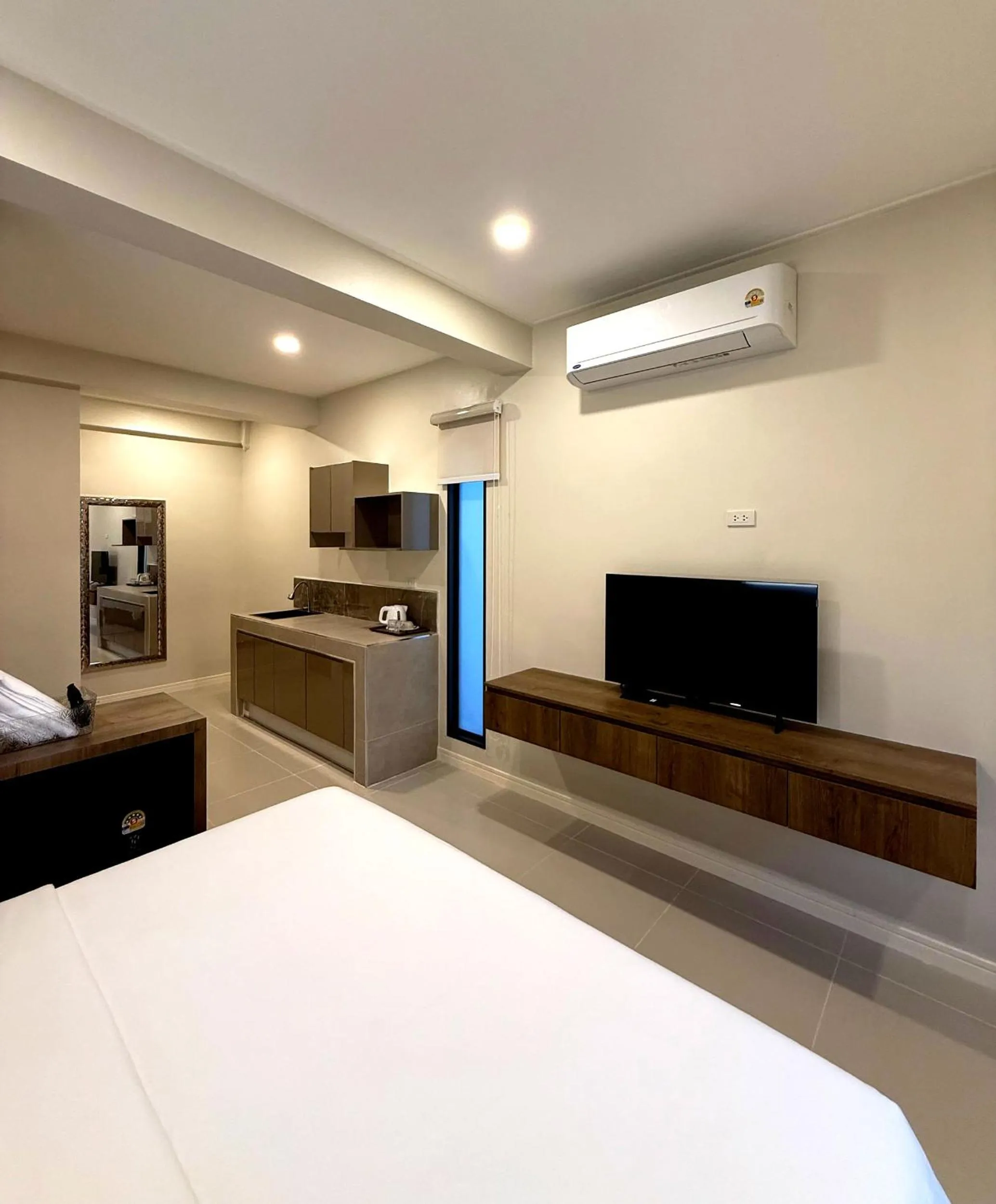 Bed in Sabaii Bay Resort