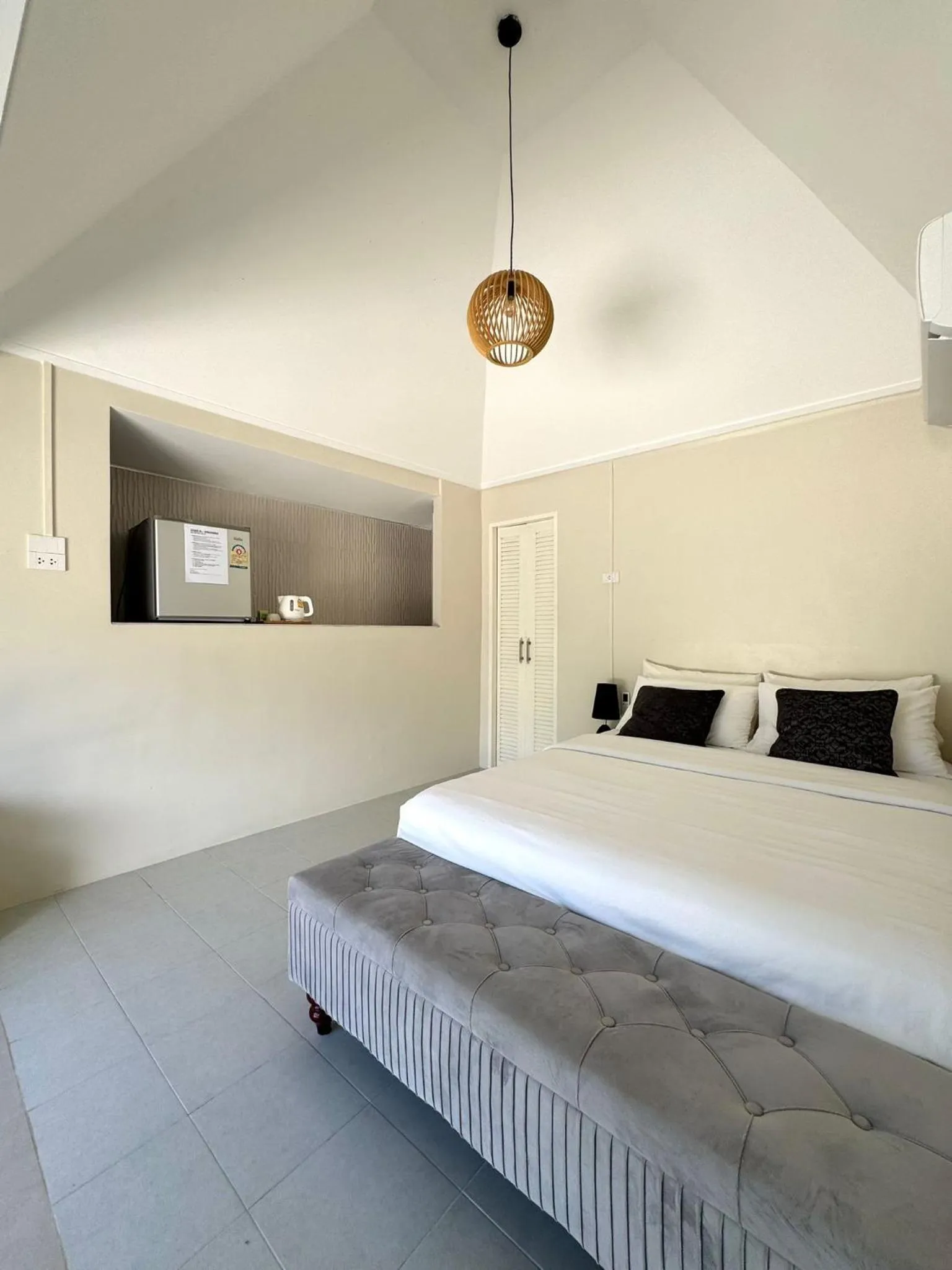 Bed in Sabaii Bay Resort