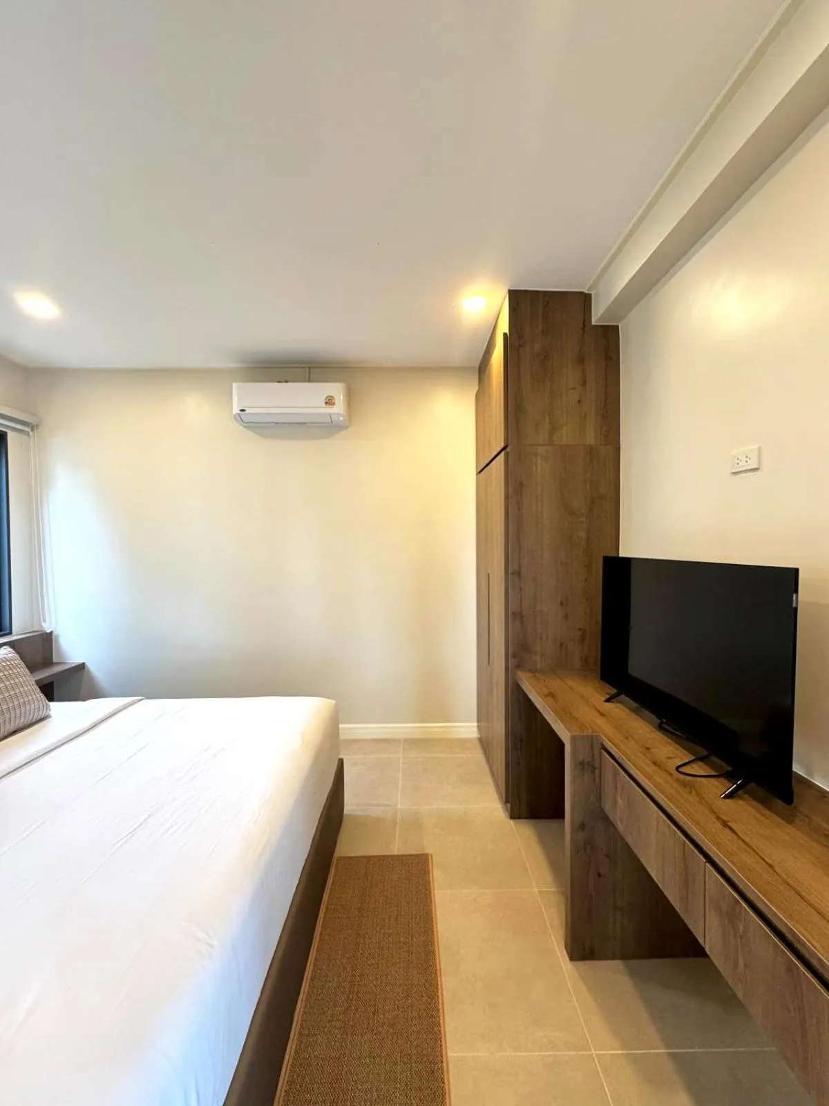 Bed in Sabaii Bay Resort