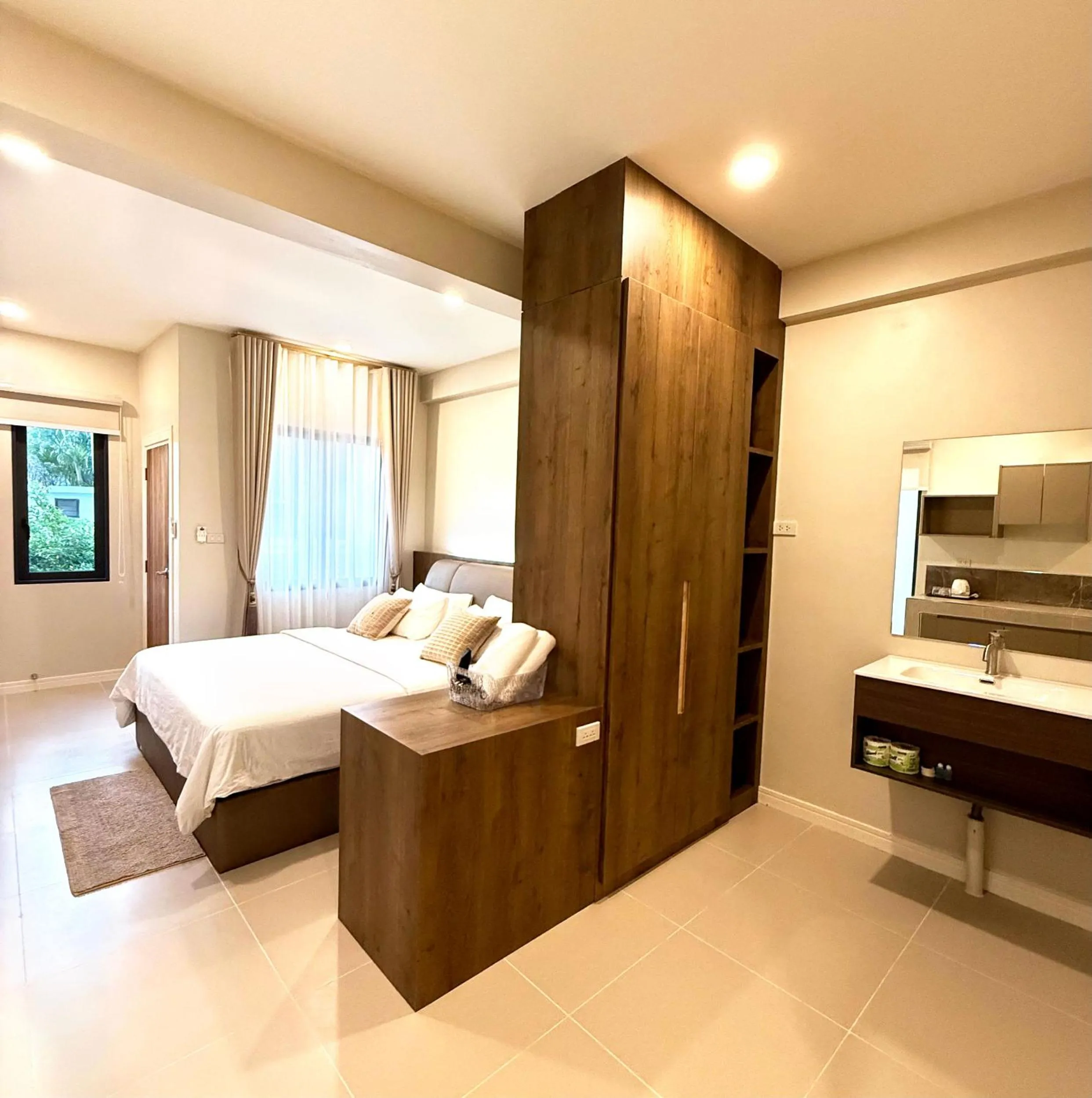 Bed in Sabaii Bay Resort