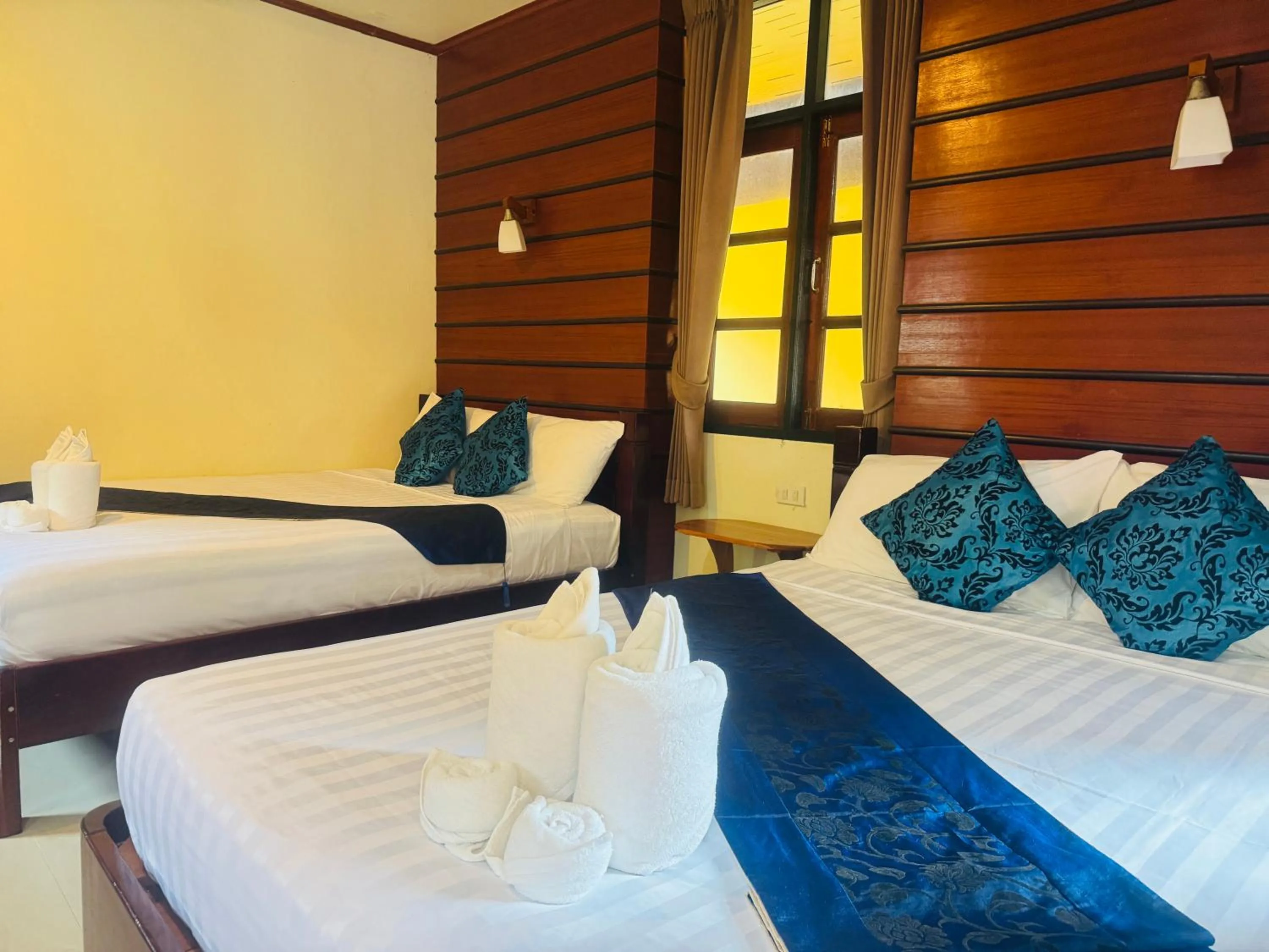 Bed in Starlight Haadrin Resort