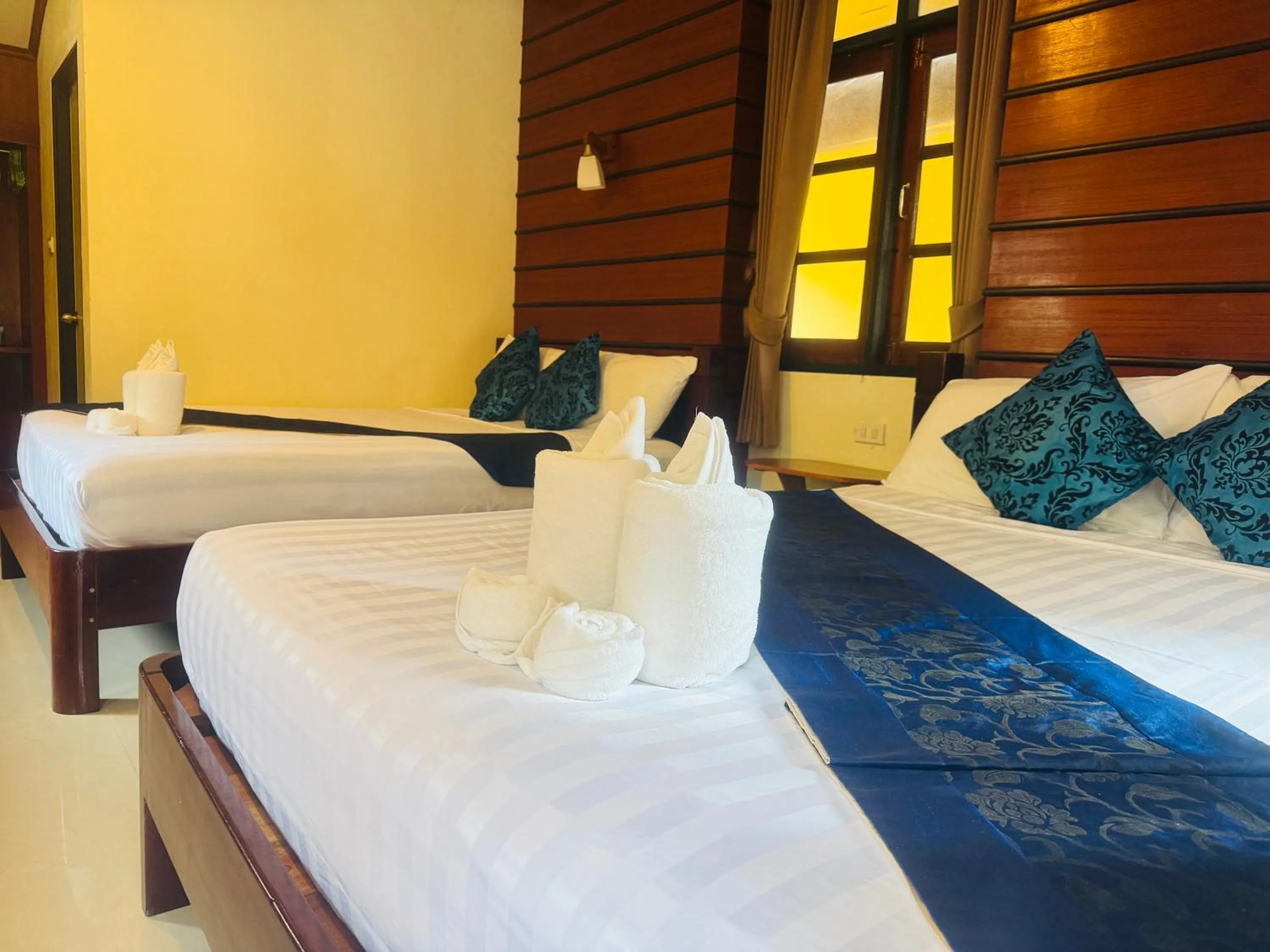 Bed in Starlight Haadrin Resort