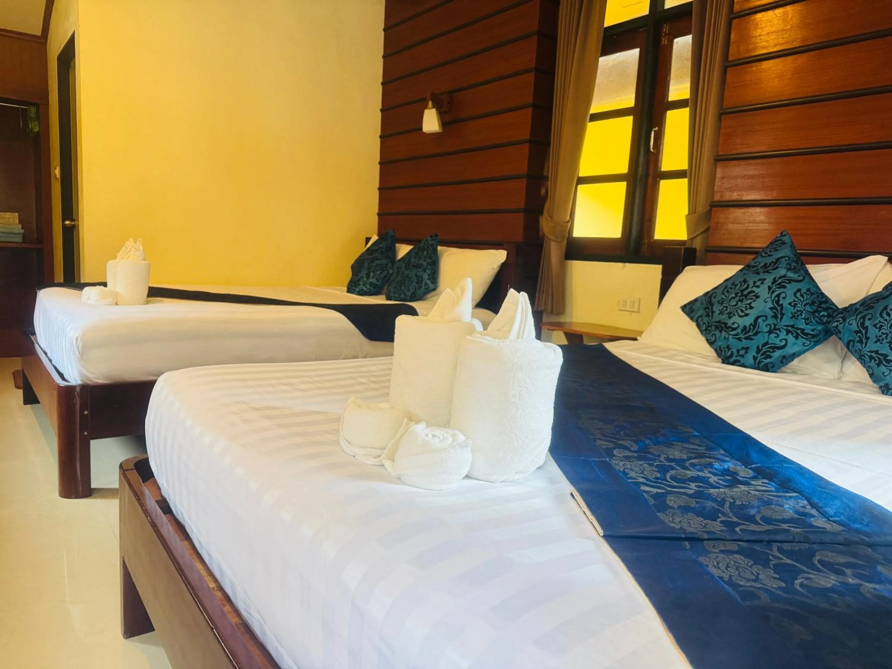 Bed in Starlight Haadrin Resort