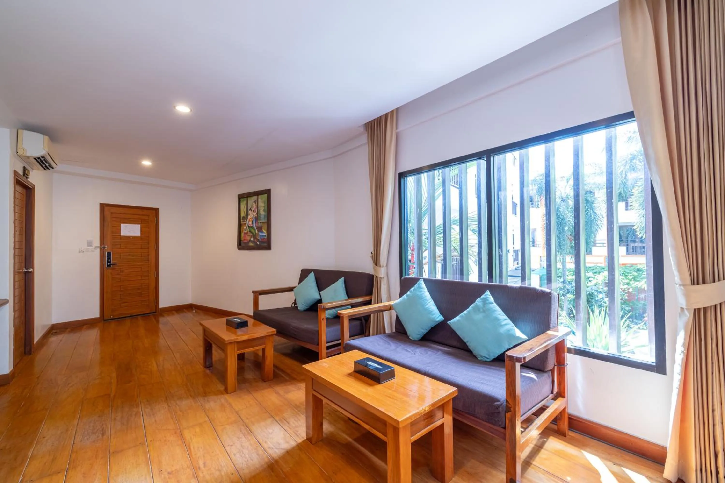Living room in Phuket Meet Holiday Hotel-Rawai 普吉岛相遇花园度假酒店-拉威店