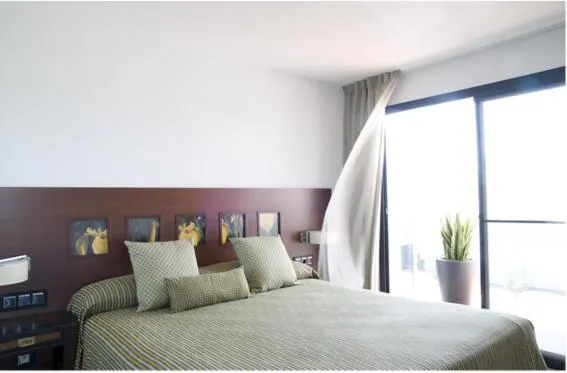 Photo of the whole room, Bed in Hotel Mar d'Espills - Adults Only