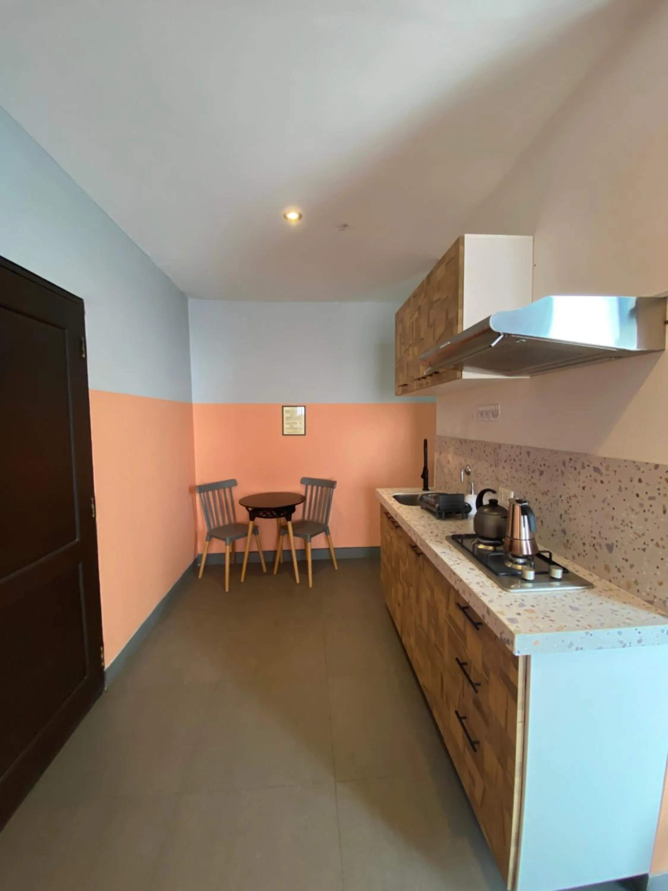 Kitchen or kitchenette in Hotel G