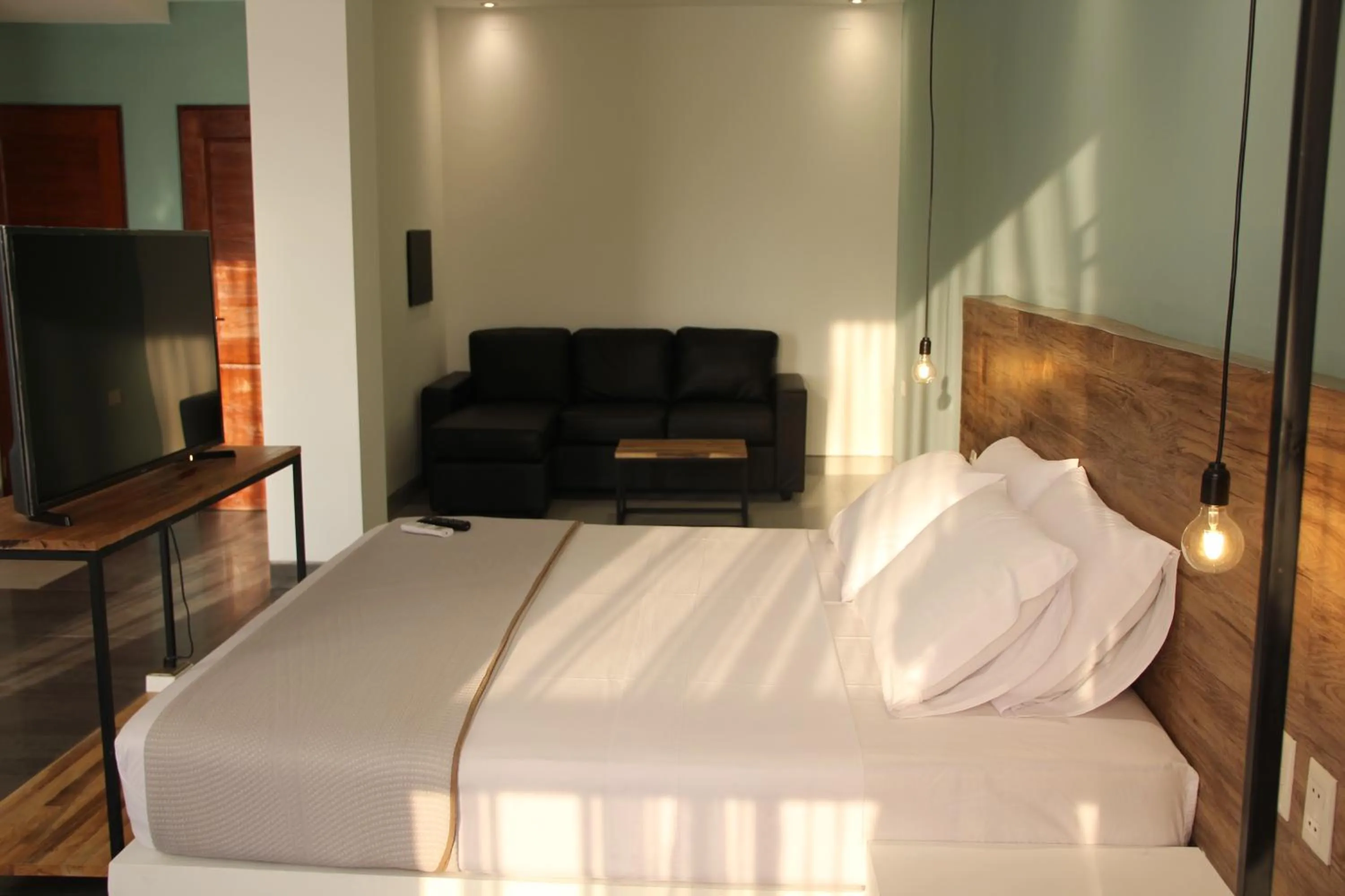 Living room, Bed in Hotel G