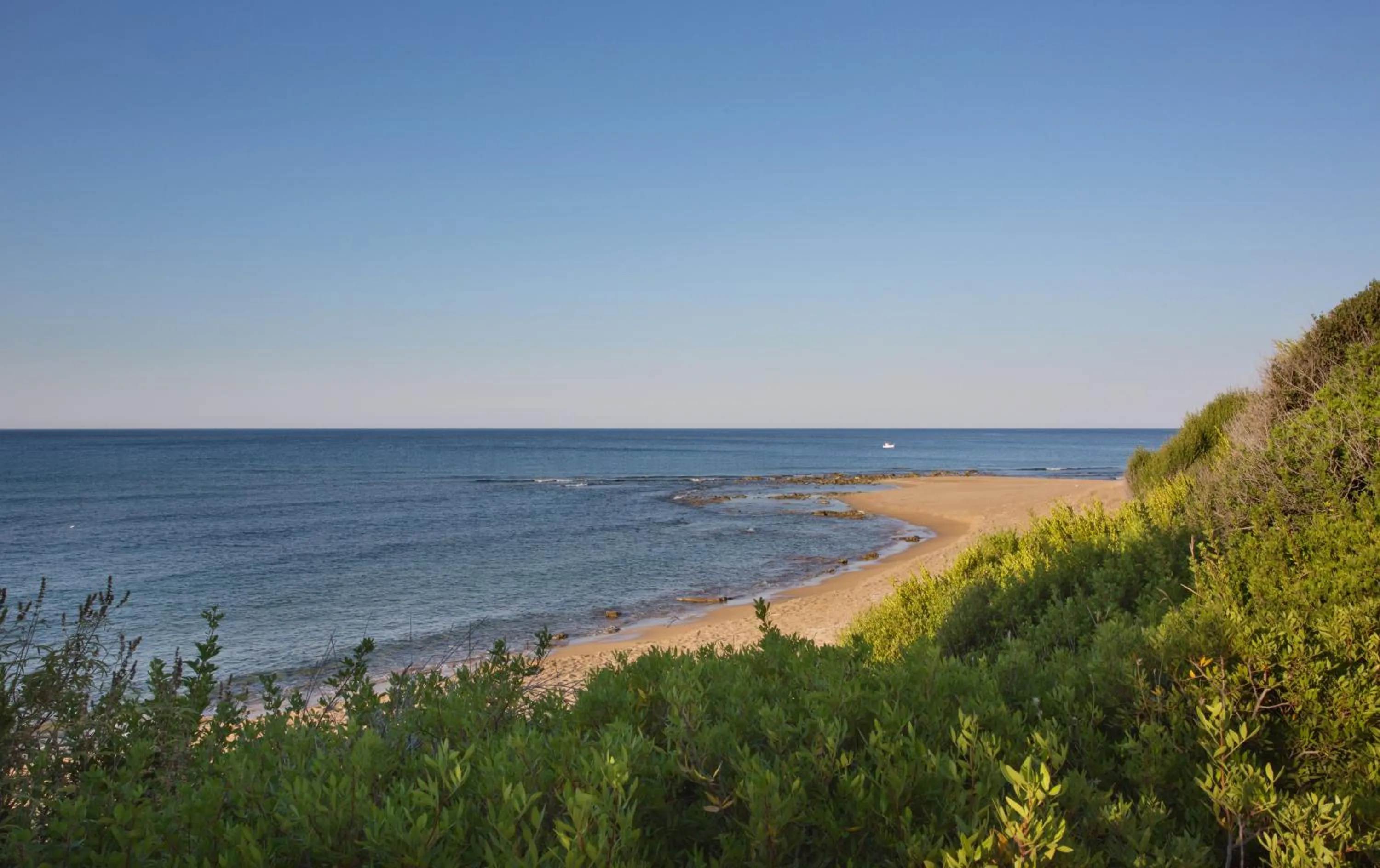 Beach in Kavos Plaza Hotel