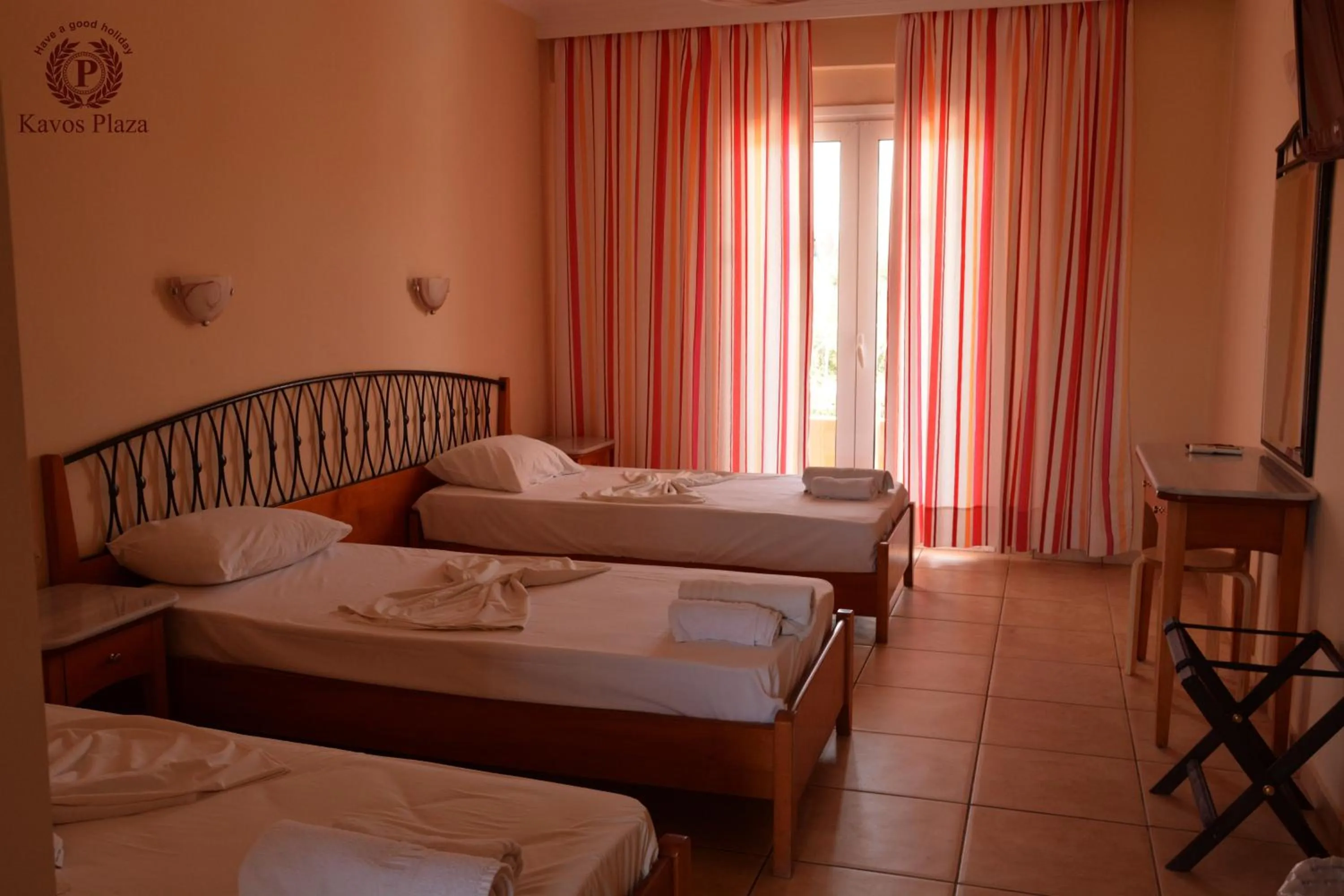 Bed in Kavos Plaza Hotel