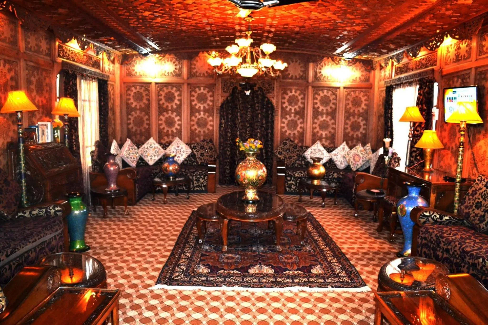 Living room in Swan Group of Houseboats, Golden Dal Lake