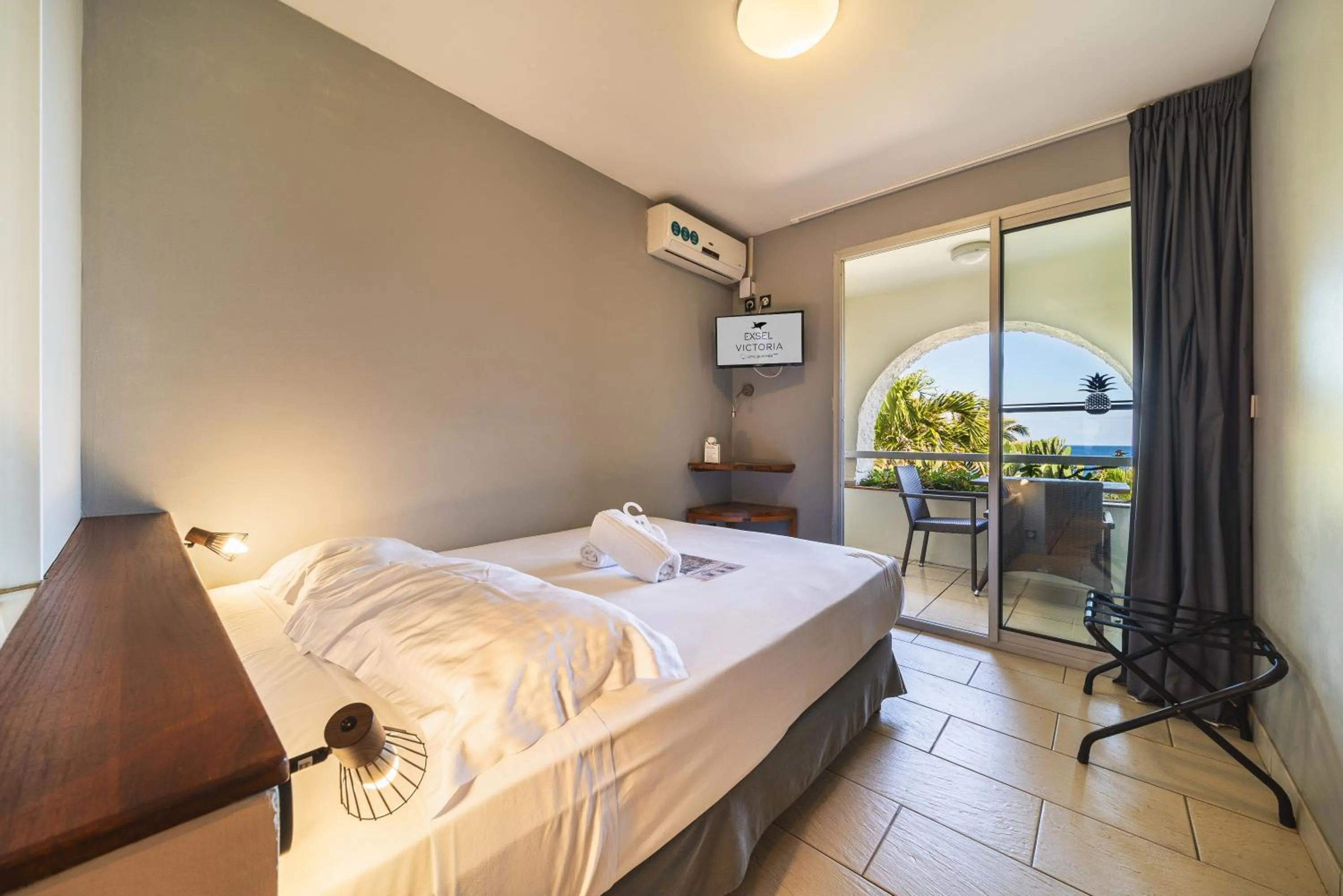 Bed in Hotel Exsel Victoria