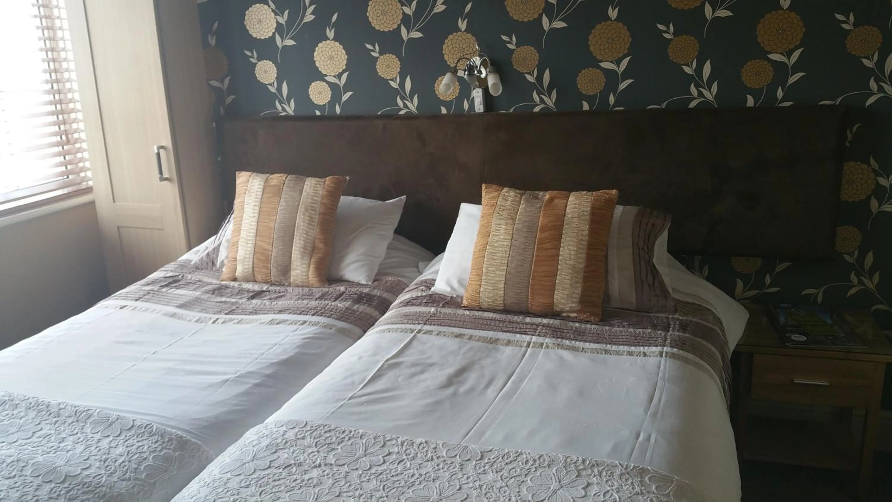 Decorative detail, Bed in Brentwood Guest House