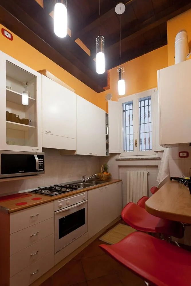 Communal kitchen in Bed & Breakfast Parmacentro