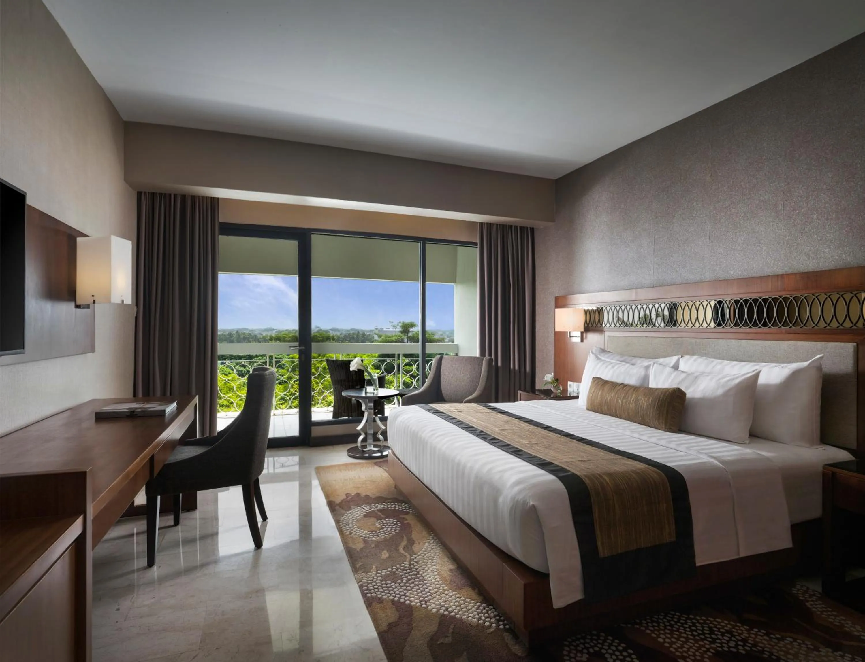 Bed in Royal Ambarrukmo Yogyakarta