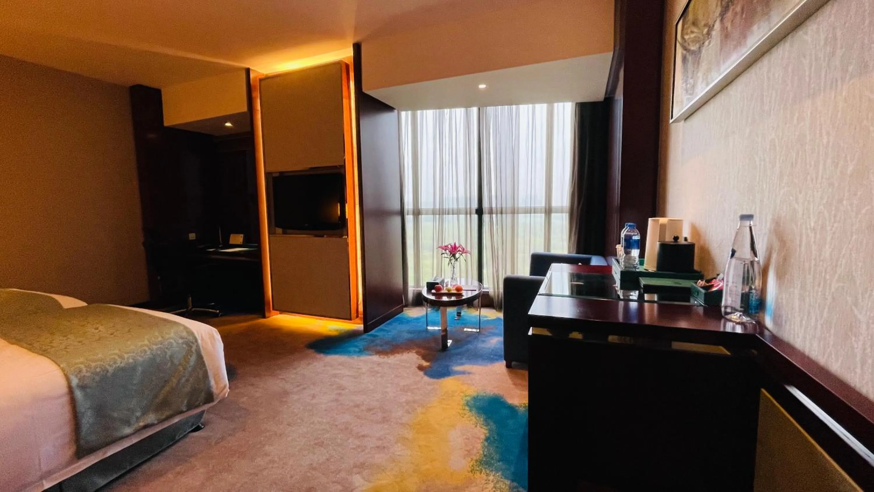 Bedroom in Grand Metropark Universal Dinosaur Town Hotel