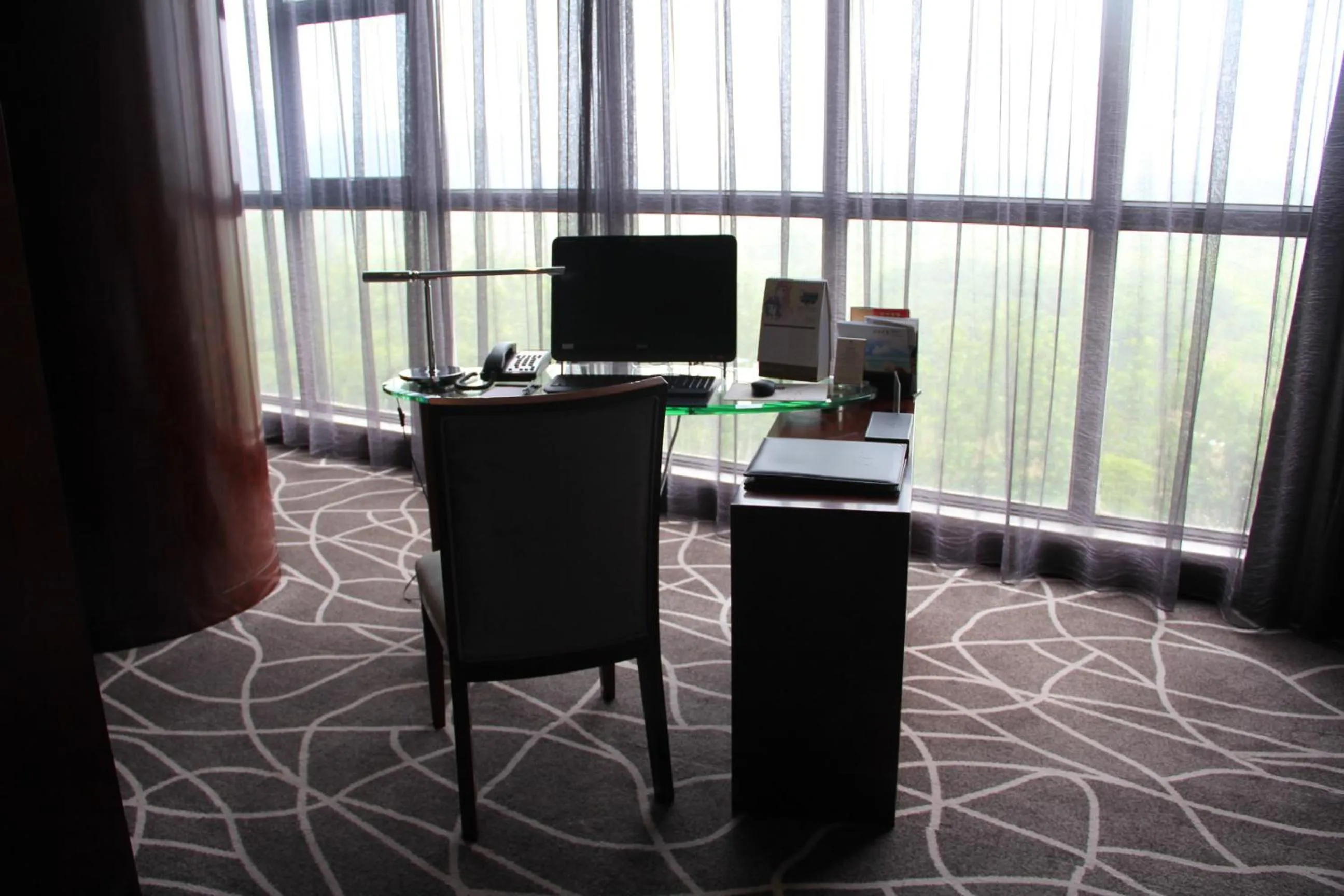 Seating area in Grand Metropark Universal Dinosaur Town Hotel