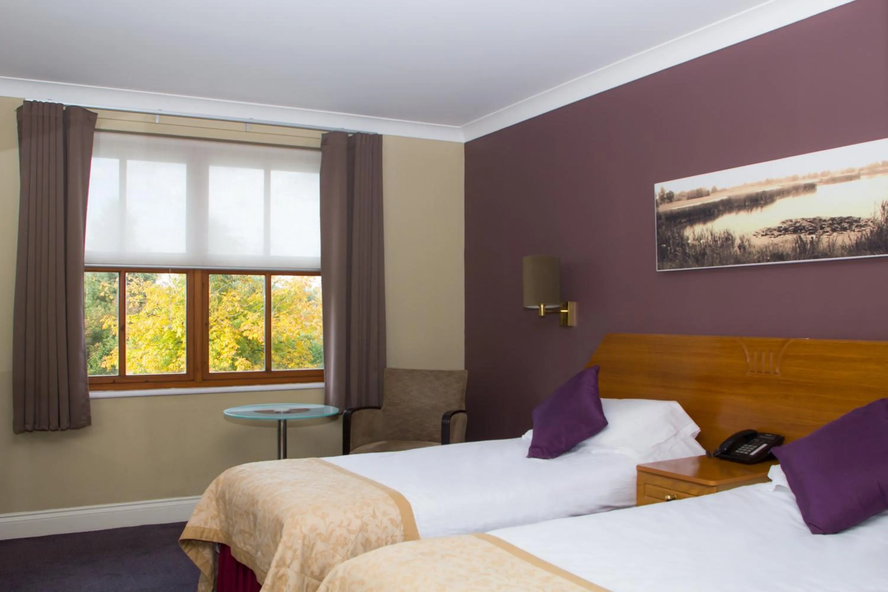 Seating area, Bed in The Essex Golf & Country Club Hotel