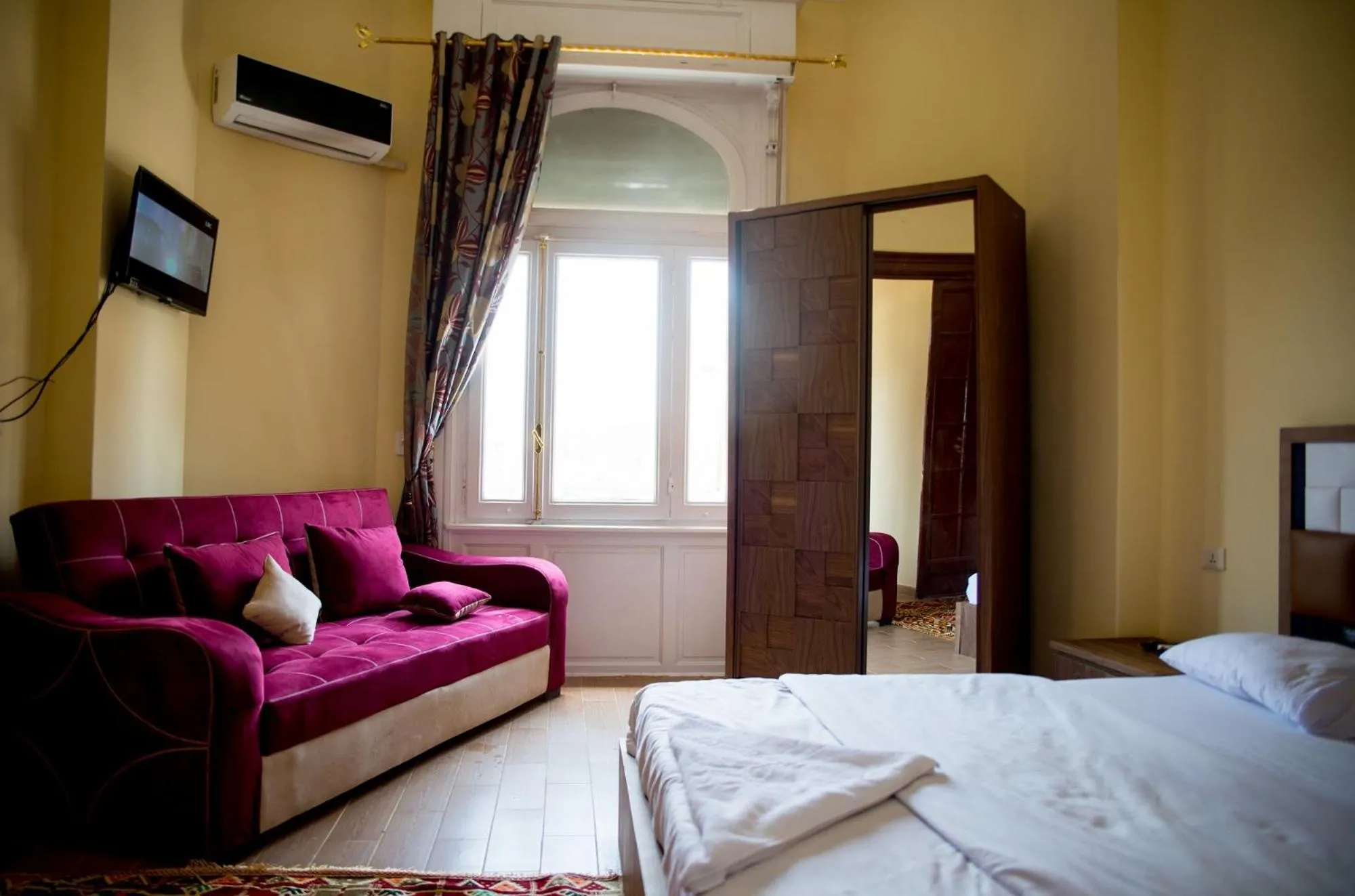 Bed in New Grand Royal Hotel Cairo