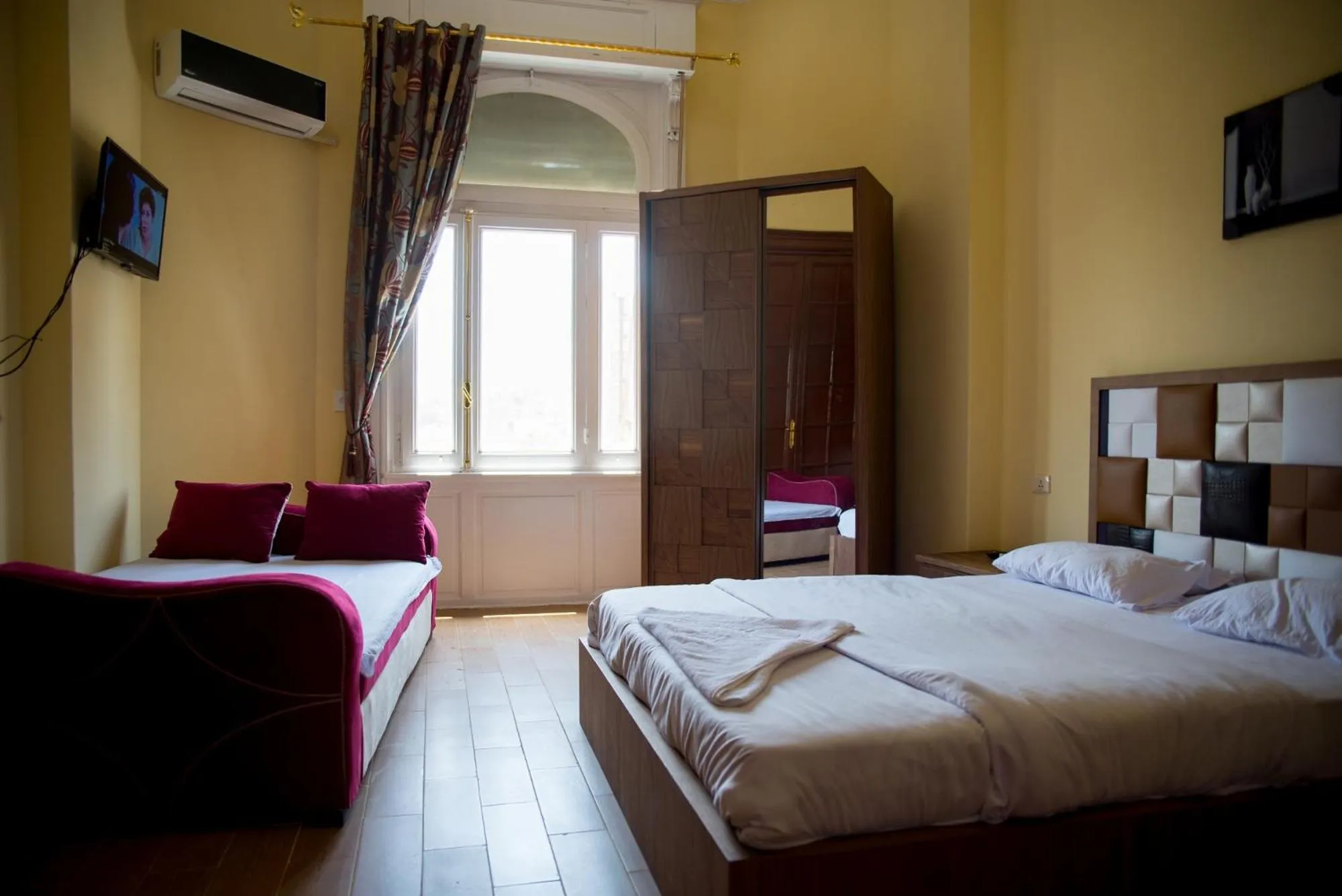 Bed in New Grand Royal Hotel Cairo